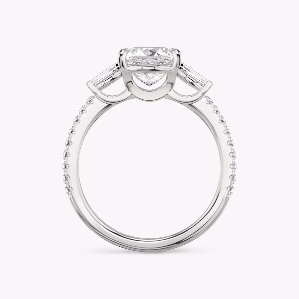 The Three Stone | Princess | Platinum | bandAccent: Pavé | sideStoneCarat: 0.10ct | sideStoneShape: Tapered Baguette | diamondOrientation: vertical | caratWeight: other