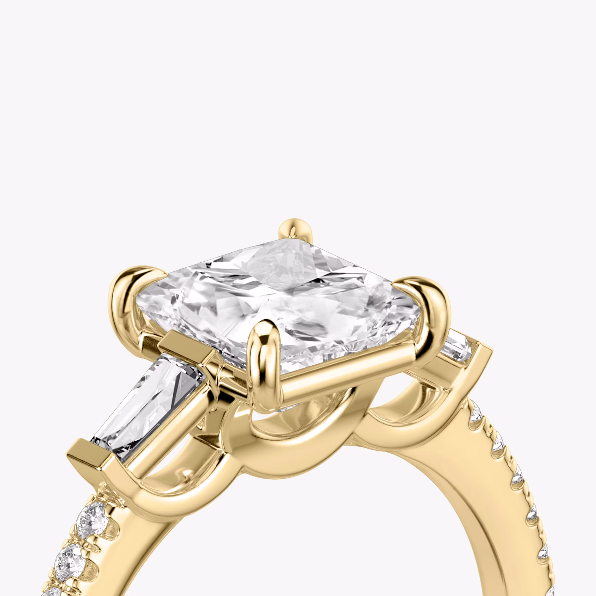 The Three Stone | Princess | 18k | Yellow Gold | bandAccent: Pavé | sideStoneCarat: 0.10ct | sideStoneShape: Tapered Baguette | diamondOrientation: vertical | caratWeight: other