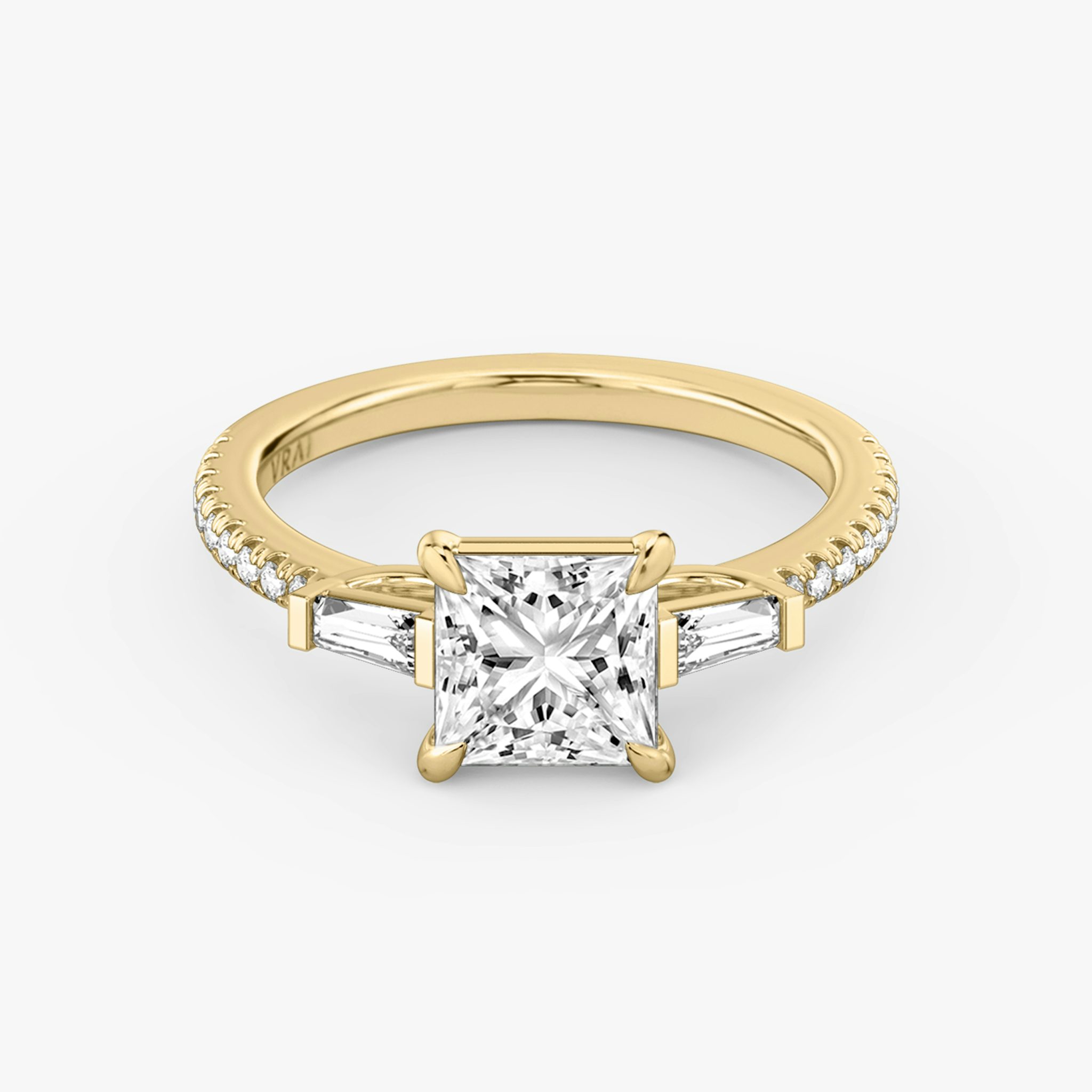 The Three Stone | Princess | 18k | Yellow Gold | bandAccent: Pavé | sideStoneCarat: 0.10ct | sideStoneShape: Tapered Baguette | diamondOrientation: vertical | caratWeight: other