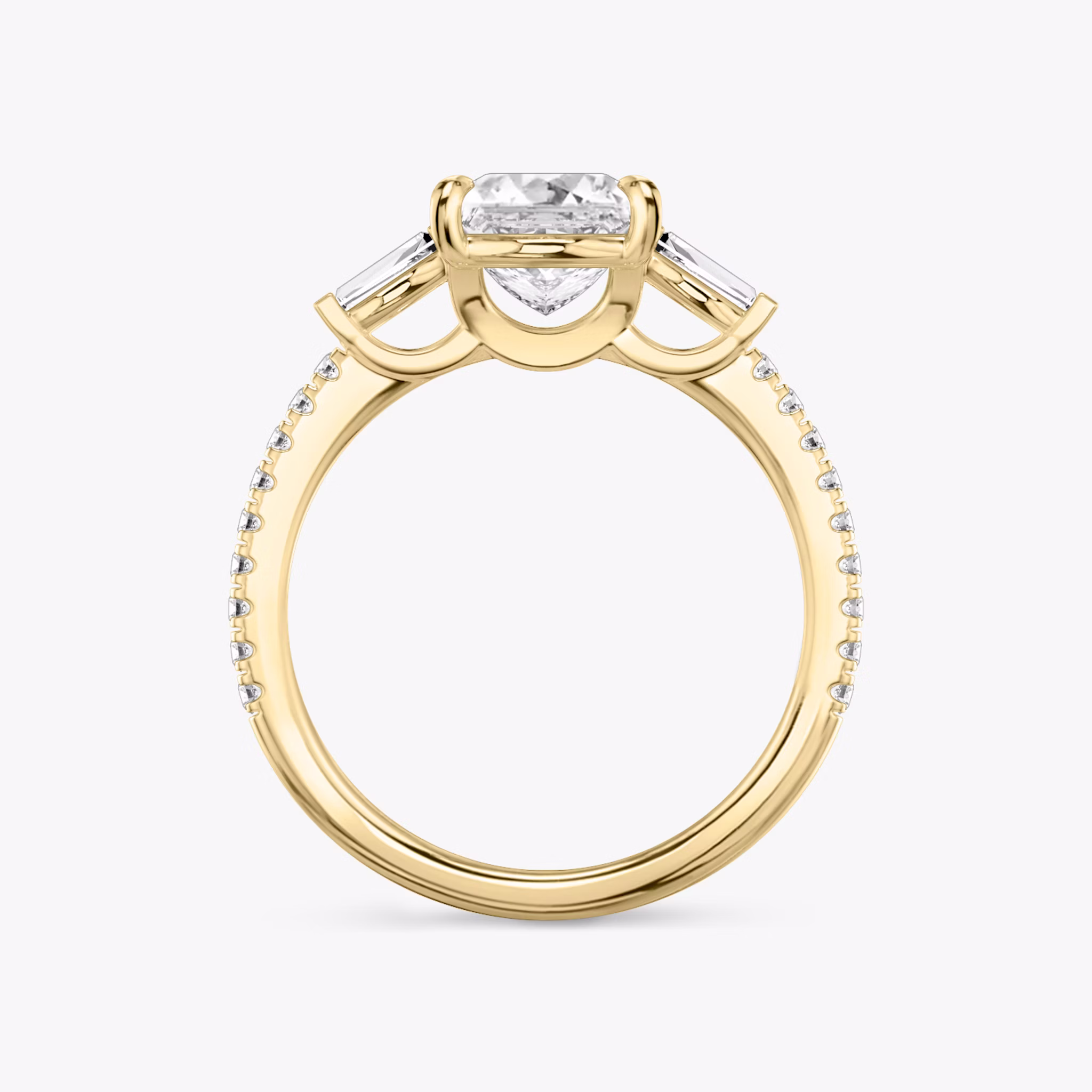 The Three Stone | Princess | 18k | Yellow Gold | bandAccent: Pavé | sideStoneCarat: 0.10ct | sideStoneShape: Tapered Baguette | diamondOrientation: vertical | caratWeight: other