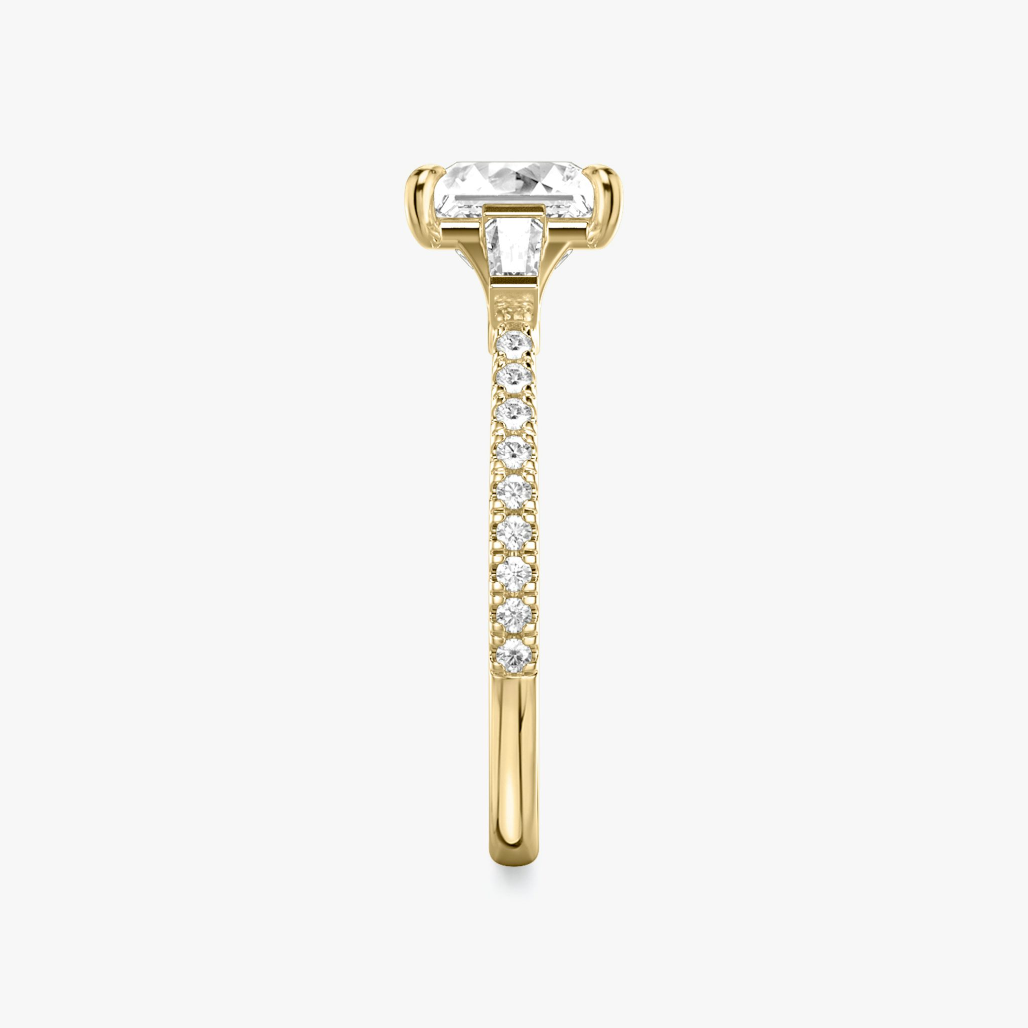 The Three Stone | Princess | 18k | Yellow Gold | bandAccent: Pavé | sideStoneCarat: 0.10ct | sideStoneShape: Tapered Baguette | diamondOrientation: vertical | caratWeight: other