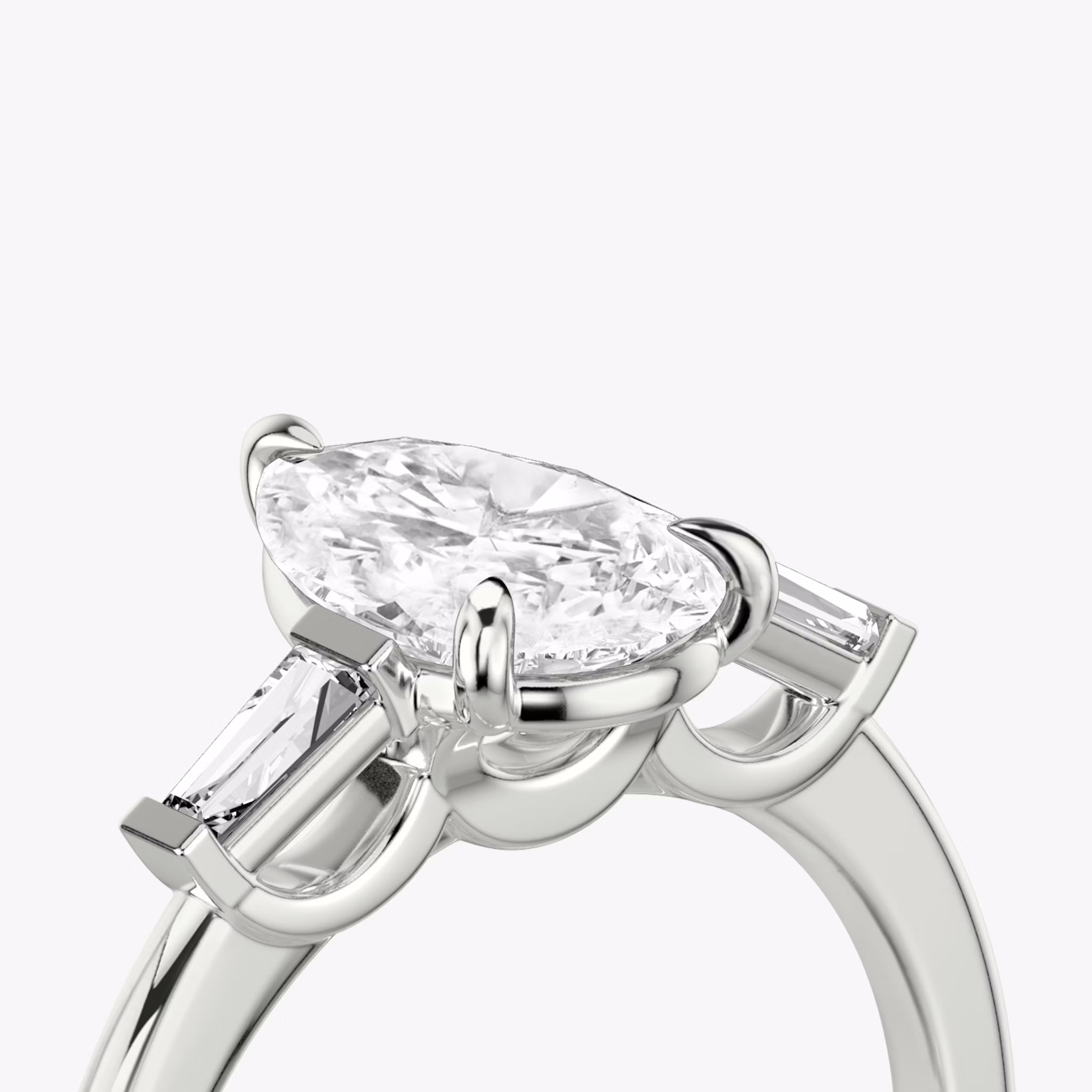 The Three Stone | Pear | Platinum | bandAccent: Plain | sideStoneCarat: 0.10ct | sideStoneShape: Tapered Baguette | diamondOrientation: vertical | caratWeight: other