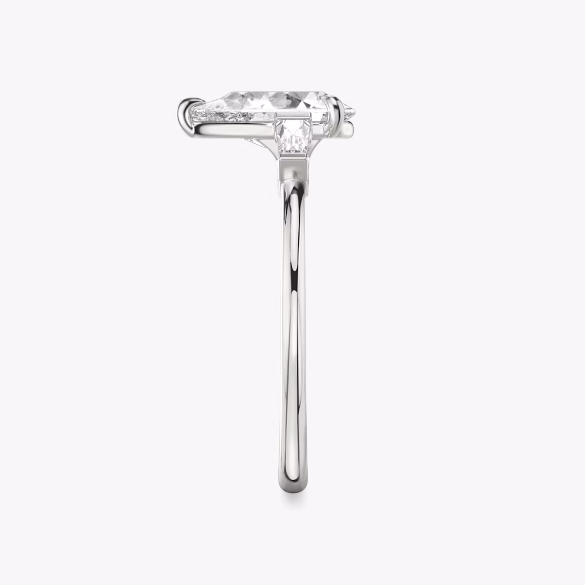 The Three Stone | Pear | Platinum | bandAccent: Plain | sideStoneCarat: 0.10ct | sideStoneShape: Tapered Baguette | diamondOrientation: vertical | caratWeight: other