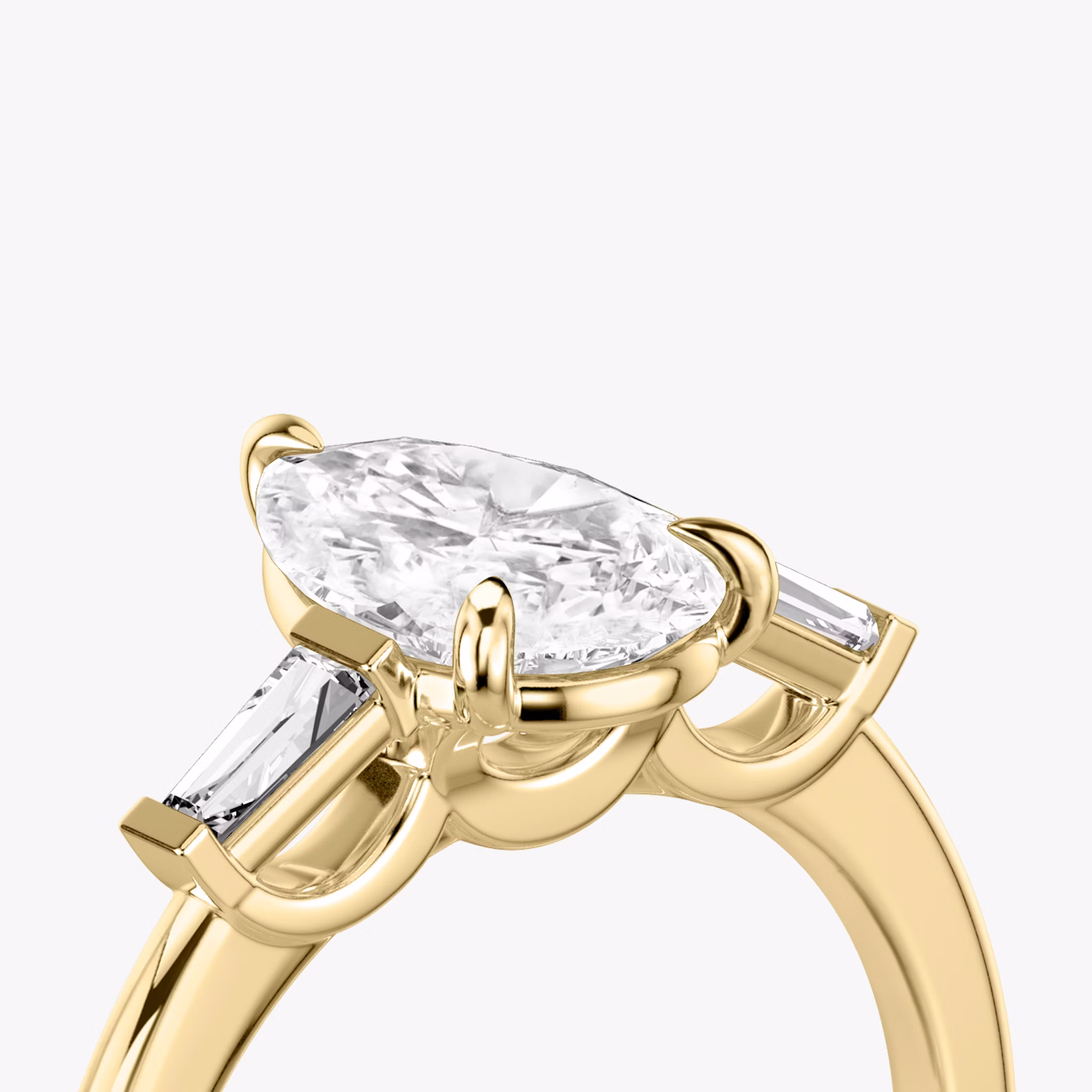 The Three Stone | Pear | 18k | Yellow Gold | bandAccent: Plain | sideStoneCarat: 0.10ct | sideStoneShape: Tapered Baguette | diamondOrientation: vertical | caratWeight: other