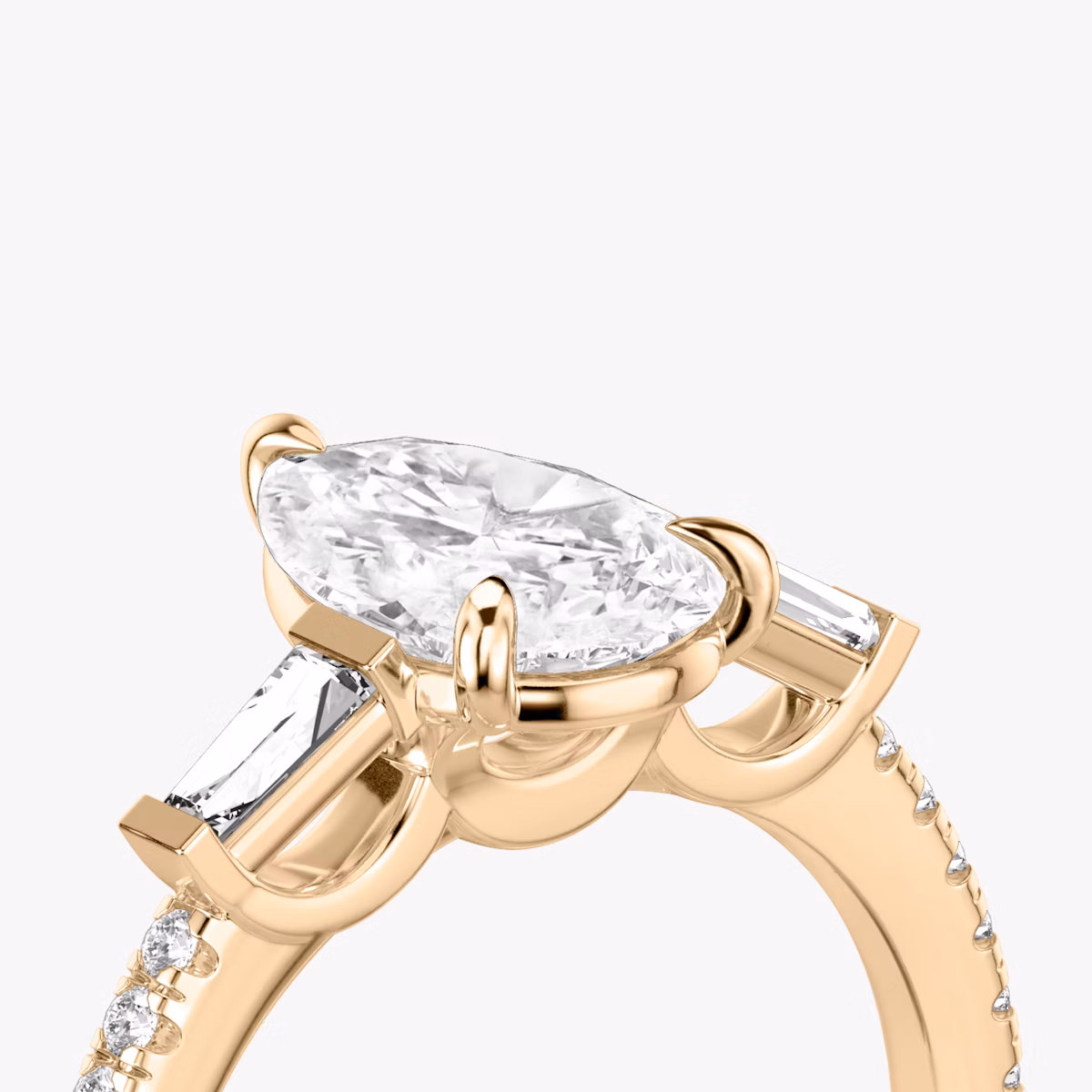 The Three Stone | Pear | 14k | Rose Gold | bandAccent: Pavé | sideStoneCarat: 0.10ct | sideStoneShape: Tapered Baguette | diamondOrientation: vertical | caratWeight: other