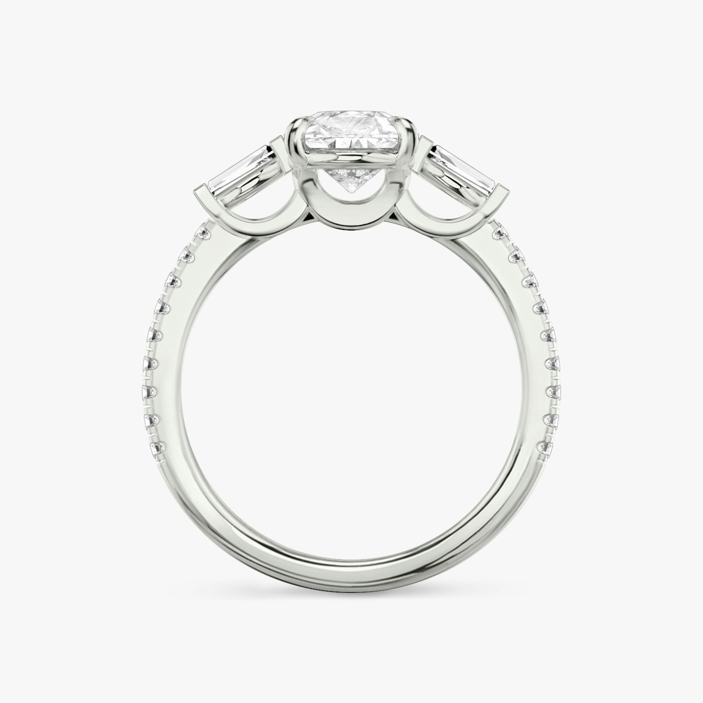 The Three Stone | Pear | Platinum | bandAccent: Pavé | sideStoneCarat: 0.10ct | sideStoneShape: Tapered Baguette | diamondOrientation: vertical | caratWeight: other