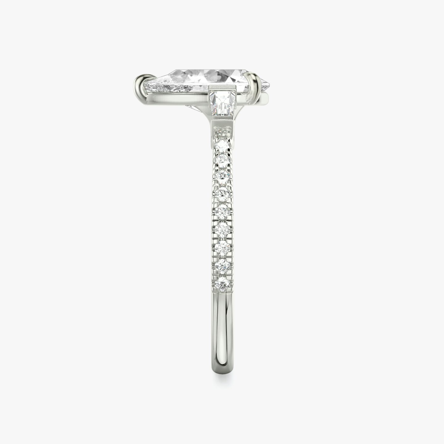 The Three Stone | Pear | Platinum | bandAccent: Pavé | sideStoneCarat: 0.10ct | sideStoneShape: Tapered Baguette | diamondOrientation: vertical | caratWeight: other