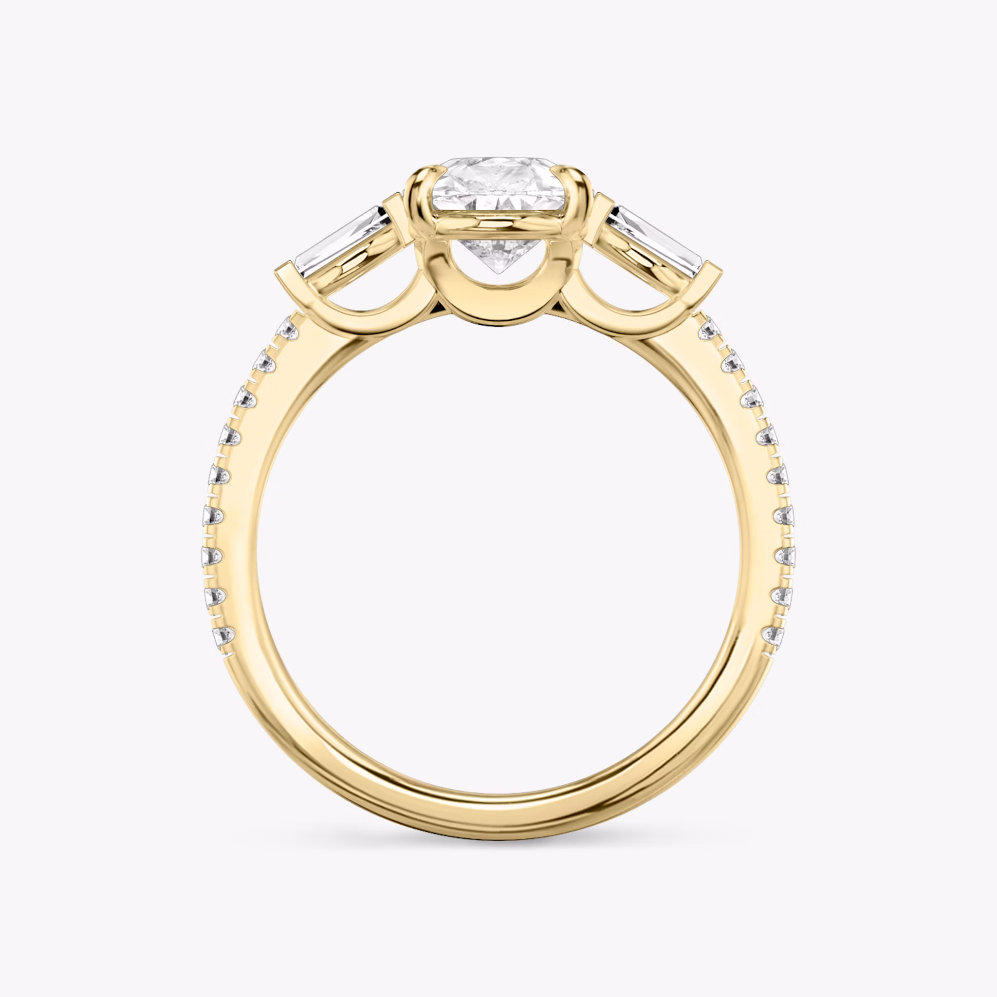 The Three Stone | Pear | 18k | Yellow Gold | bandAccent: Pavé | sideStoneCarat: 0.10ct | sideStoneShape: Tapered Baguette | diamondOrientation: vertical | caratWeight: other