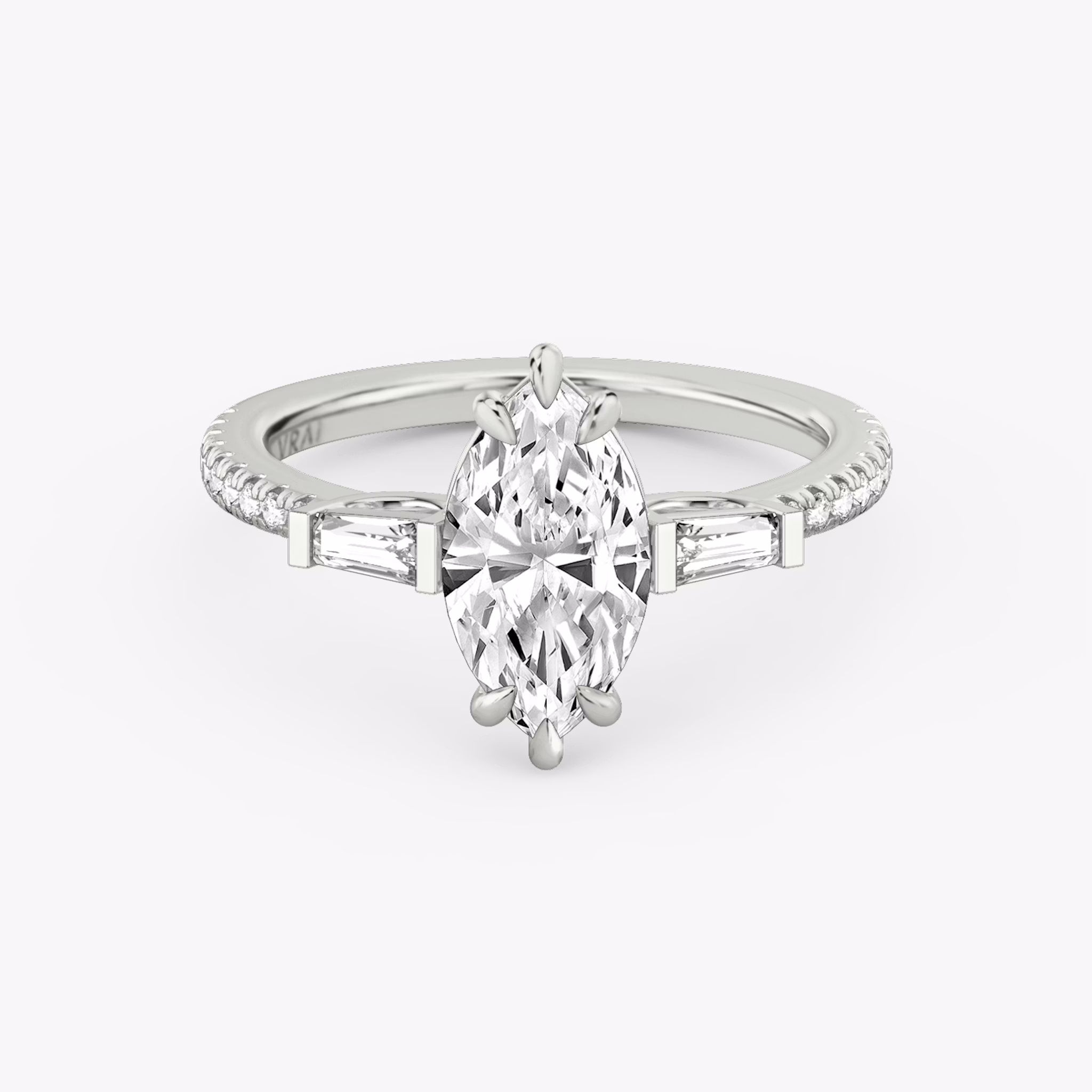 The Three Stone | Marquise | Platinum | bandAccent: Pavé | sideStoneCarat: 0.10ct | sideStoneShape: Tapered Baguette | diamondOrientation: vertical | caratWeight: other