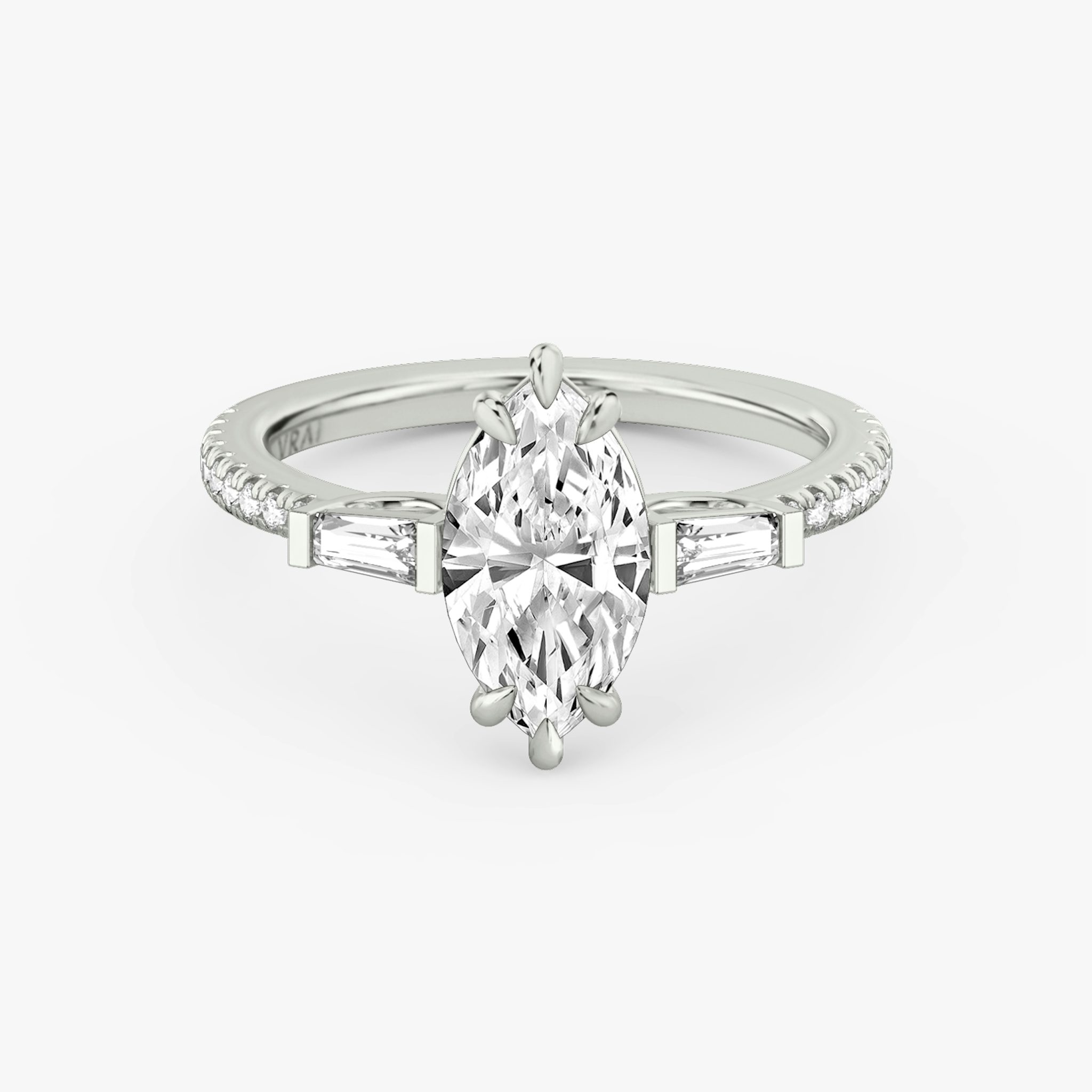 The Three Stone | Marquise | Platinum | bandAccent: Pavé | sideStoneCarat: 0.10ct | sideStoneShape: Tapered Baguette | diamondOrientation: vertical | caratWeight: other