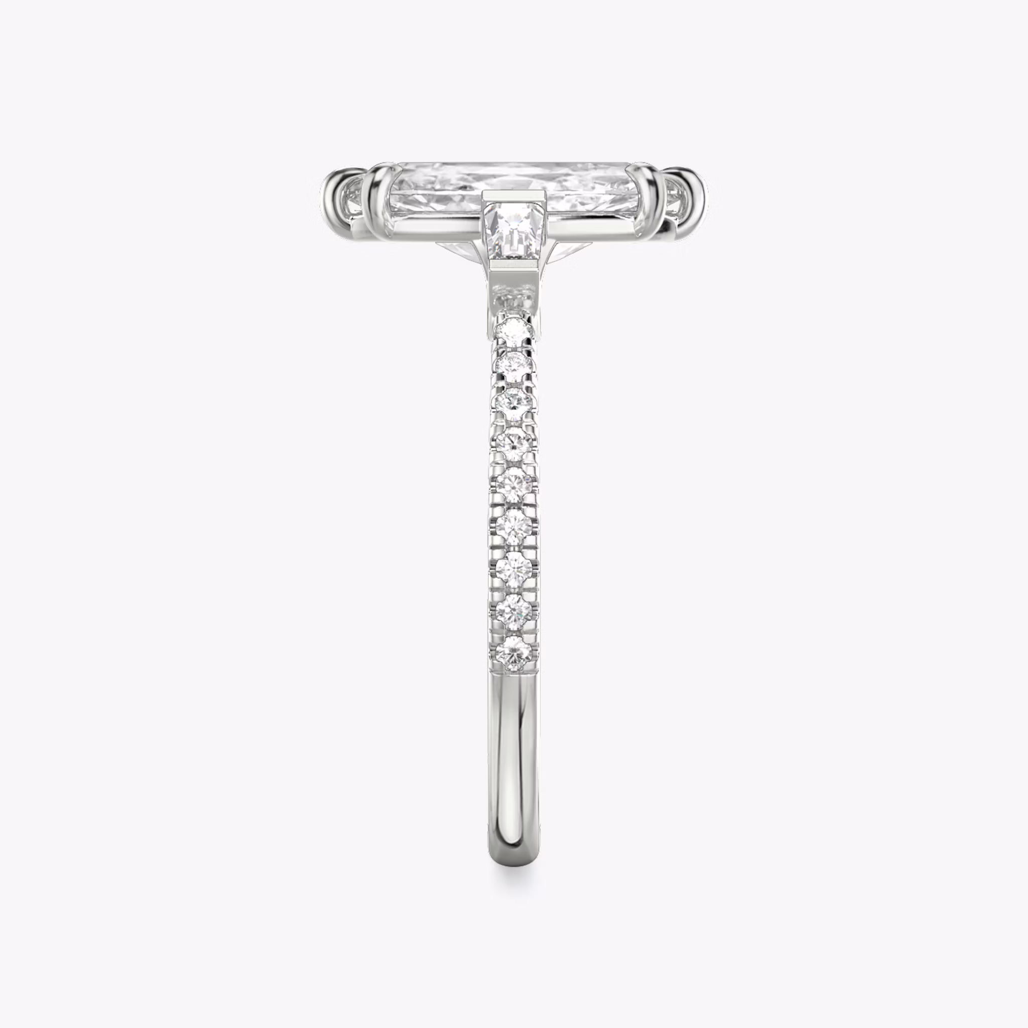 The Three Stone | Marquise | Platinum | bandAccent: Pavé | sideStoneCarat: 0.10ct | sideStoneShape: Tapered Baguette | diamondOrientation: vertical | caratWeight: other
