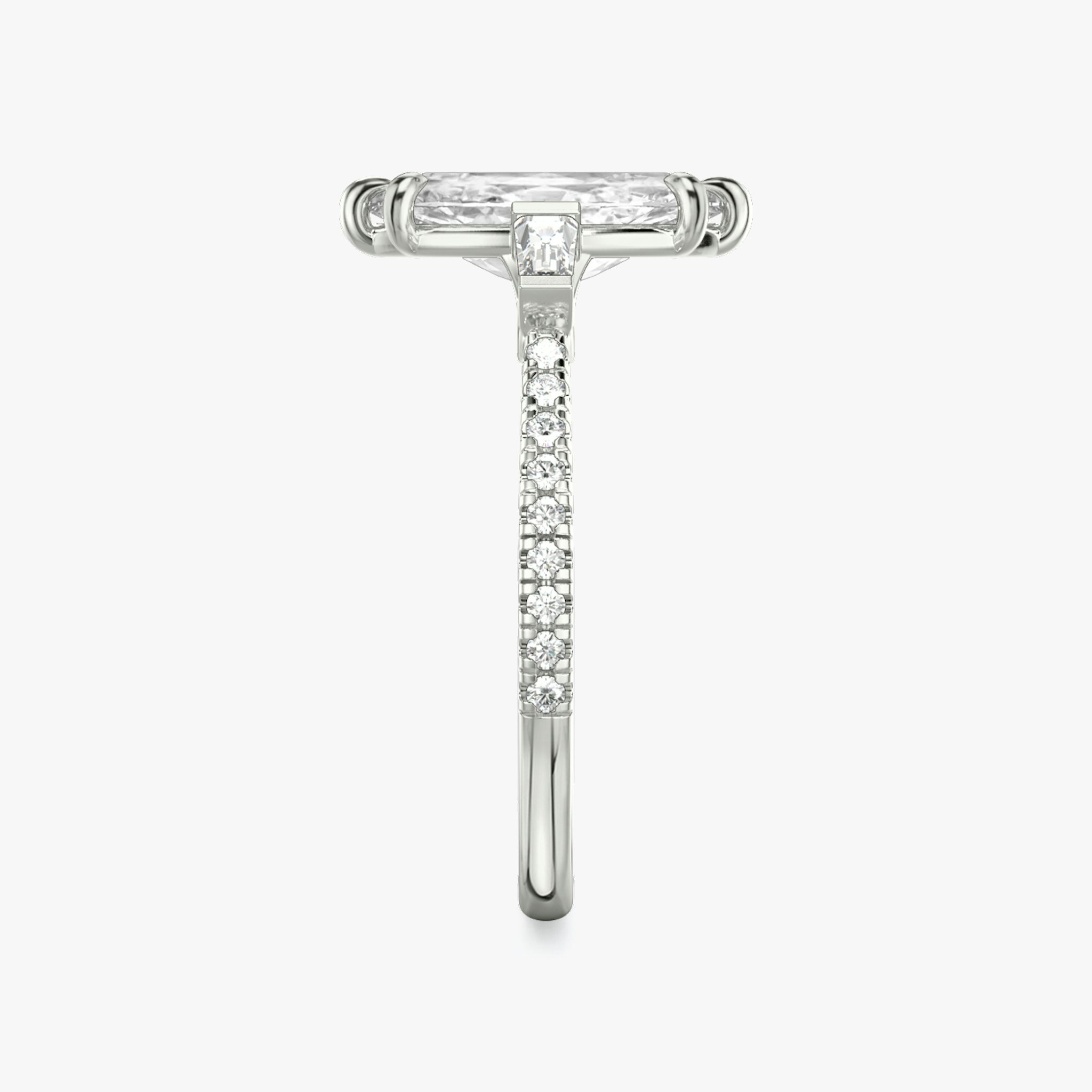 The Three Stone | Marquise | Platinum | bandAccent: Pavé | sideStoneCarat: 0.10ct | sideStoneShape: Tapered Baguette | diamondOrientation: vertical | caratWeight: other
