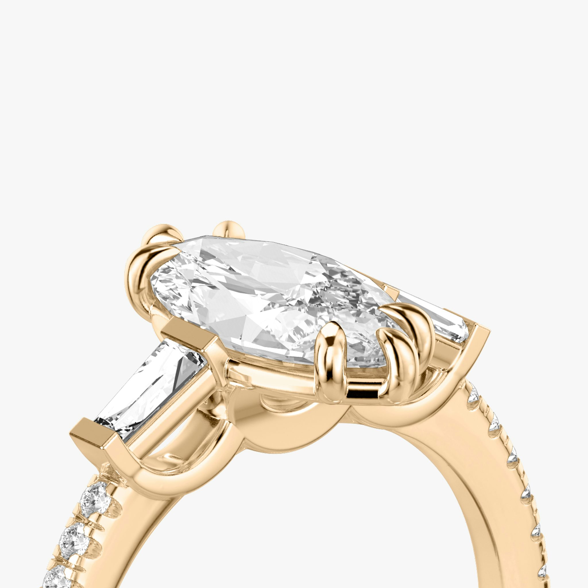 The Three Stone | Marquise | 14k | Rose Gold | bandAccent: Pavé | sideStoneCarat: 0.10ct | sideStoneShape: Tapered Baguette | diamondOrientation: vertical | caratWeight: other