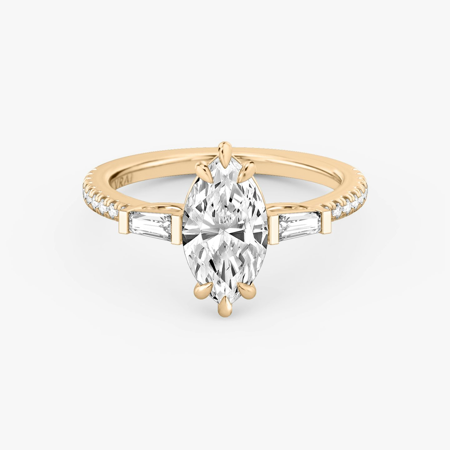 The Three Stone | Marquise | 14k | Rose Gold | bandAccent: Pavé | sideStoneCarat: 0.10ct | sideStoneShape: Tapered Baguette | diamondOrientation: vertical | caratWeight: other
