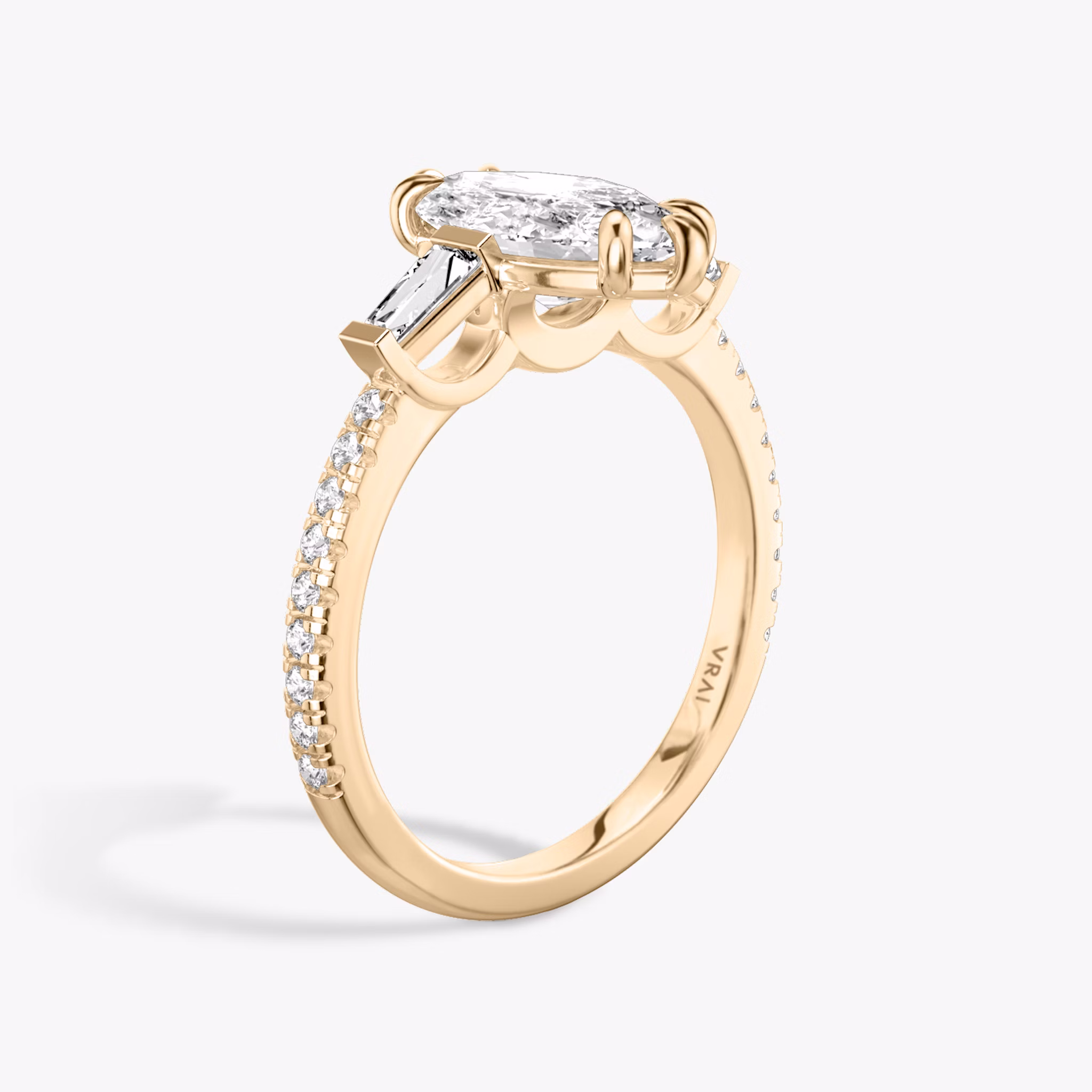 The Three Stone | Marquise | 14k | Rose Gold | bandAccent: Pavé | sideStoneCarat: 0.10ct | sideStoneShape: Tapered Baguette | diamondOrientation: vertical | caratWeight: other