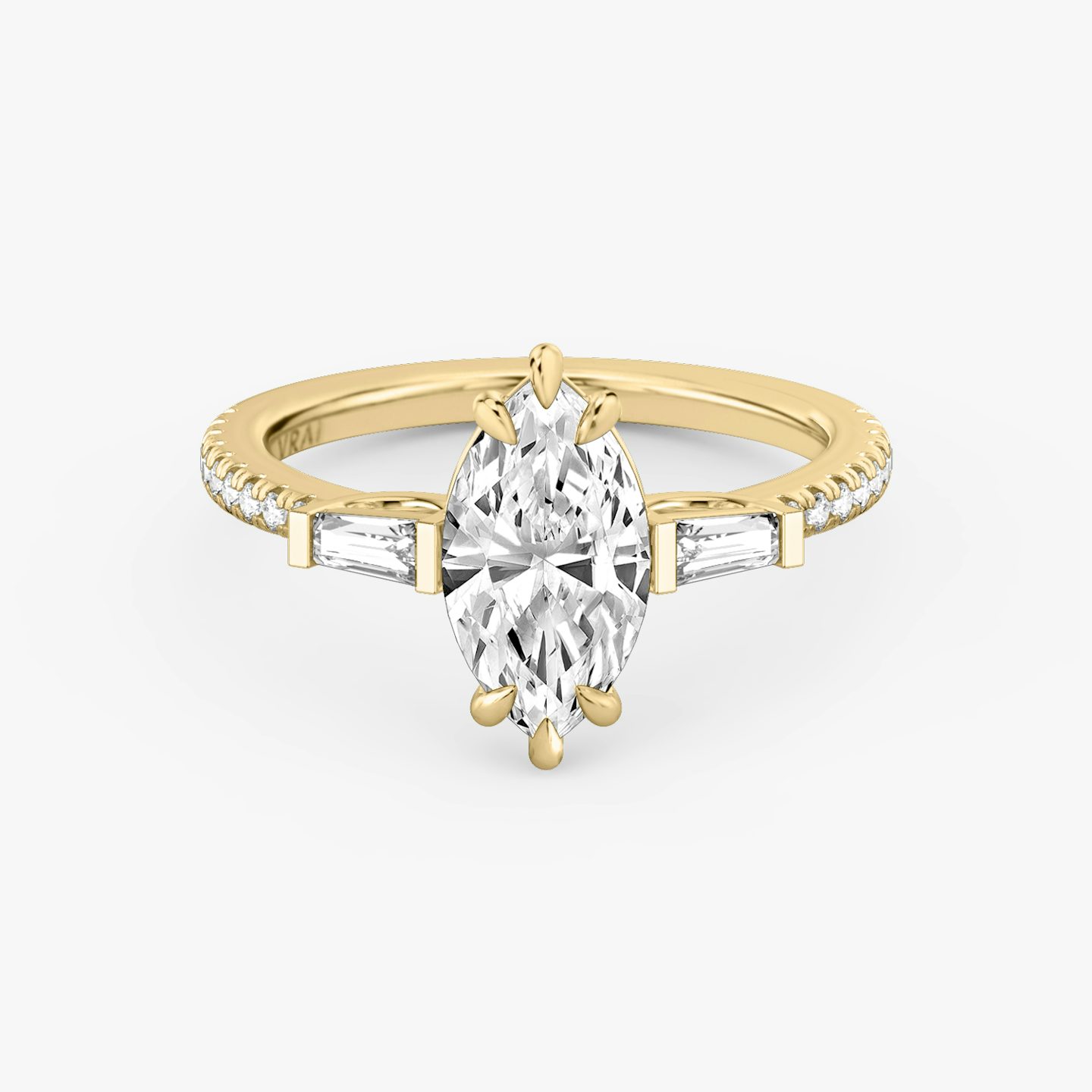 The Three Stone | Marquise | 18k | Yellow Gold | bandAccent: Pavé | sideStoneCarat: 0.10ct | sideStoneShape: Tapered Baguette | diamondOrientation: vertical | caratWeight: other