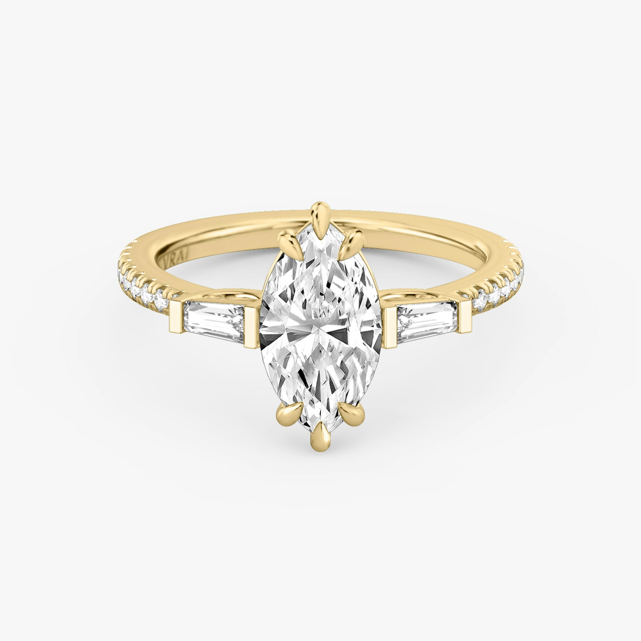 Three Stone | Marquise | 18k | Gelbgold | bandAccent: Mit Pavé-Besatz | sideStoneCarat: 0.10ct | sideStoneShape: Konisches Baguette | diamondOrientation: vertical | caratWeight: other