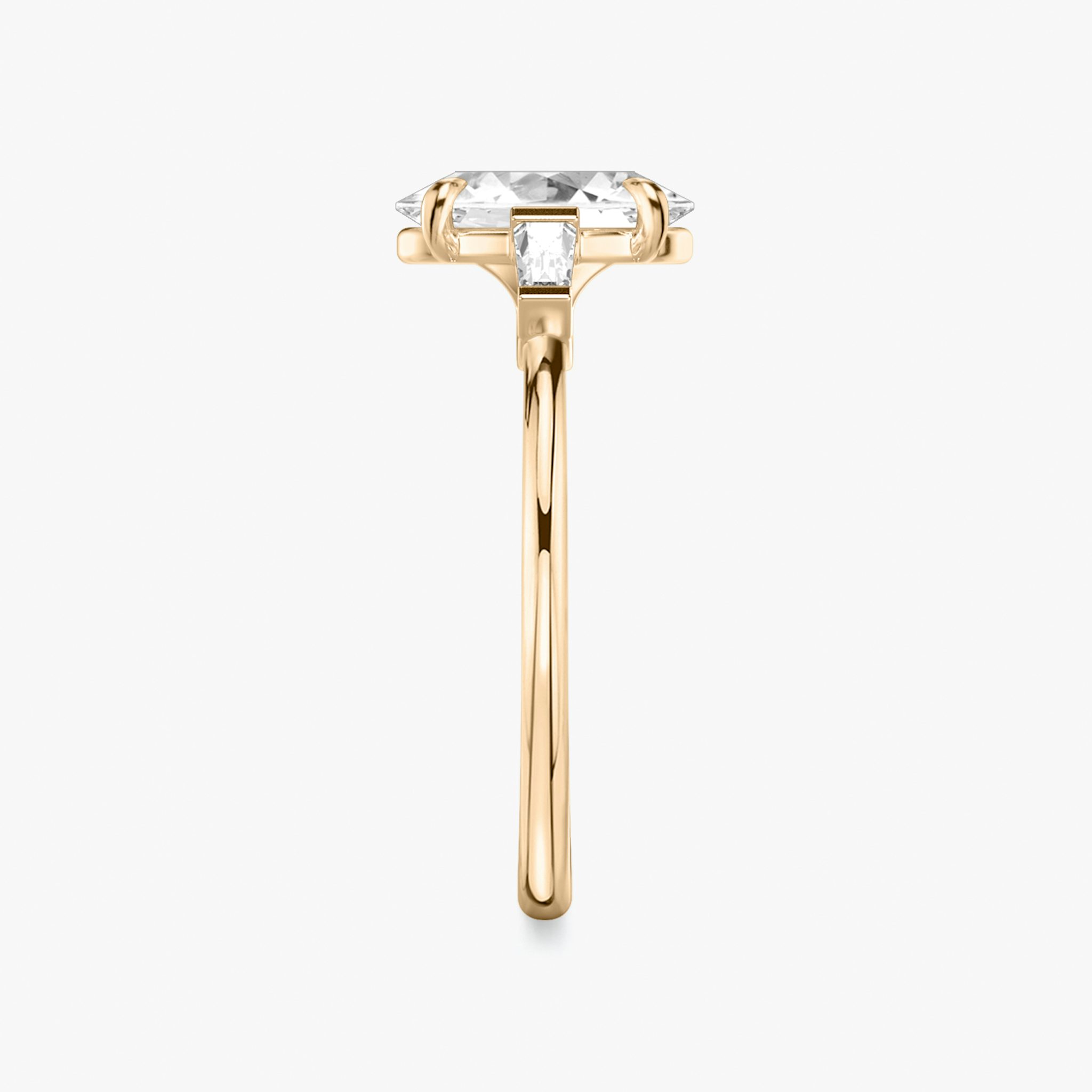 The Three Stone | Oval | 14k | Rose Gold | bandAccent: Plain | sideStoneCarat: 0.10ct | sideStoneShape: Tapered Baguette | diamondOrientation: vertical | caratWeight: other
