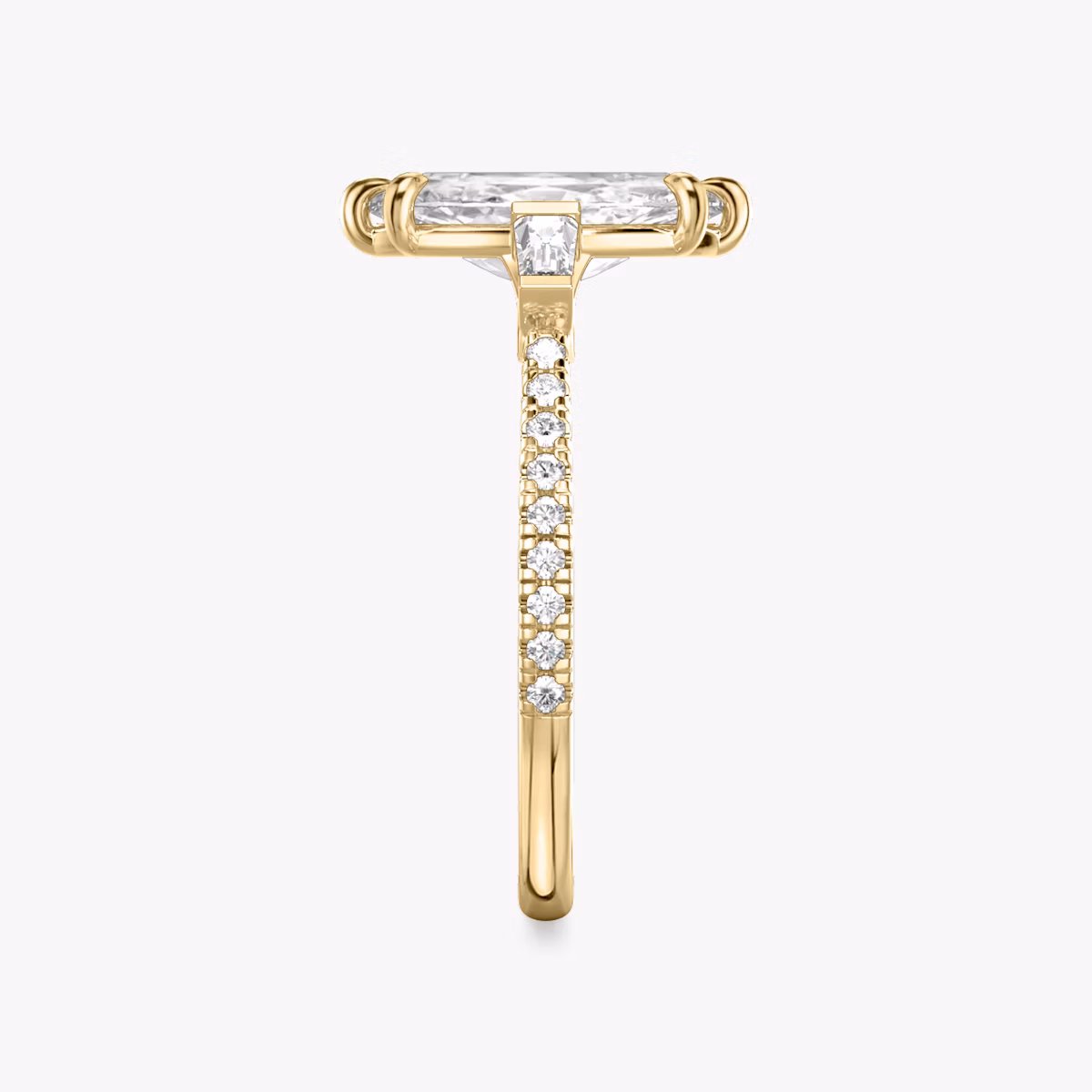 The Three Stone | Marquise | 18k | Yellow Gold | bandAccent: Pavé | sideStoneCarat: 0.10ct | sideStoneShape: Tapered Baguette | diamondOrientation: vertical | caratWeight: other