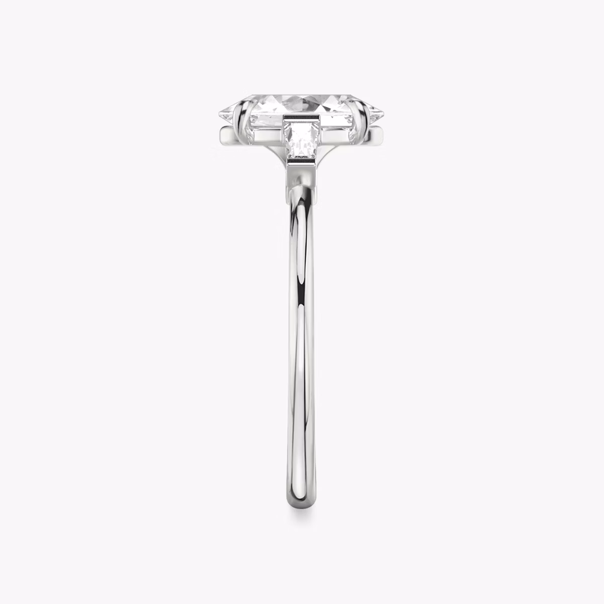 The Three Stone | Oval | 18k | White Gold | bandAccent: Plain | sideStoneCarat: 0.10ct | sideStoneShape: Tapered Baguette | diamondOrientation: vertical | caratWeight: other