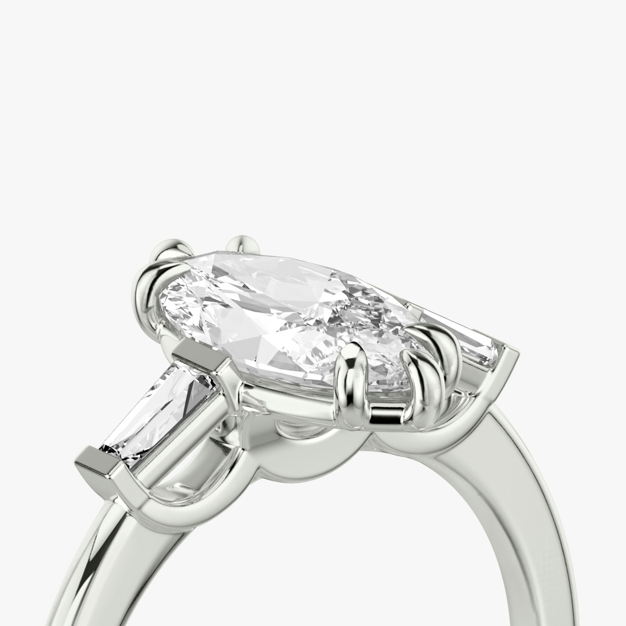 The Three Stone | Marquise | 18k | White Gold | bandAccent: Plain | sideStoneCarat: 0.10ct | sideStoneShape: Tapered Baguette | diamondOrientation: vertical | caratWeight: other