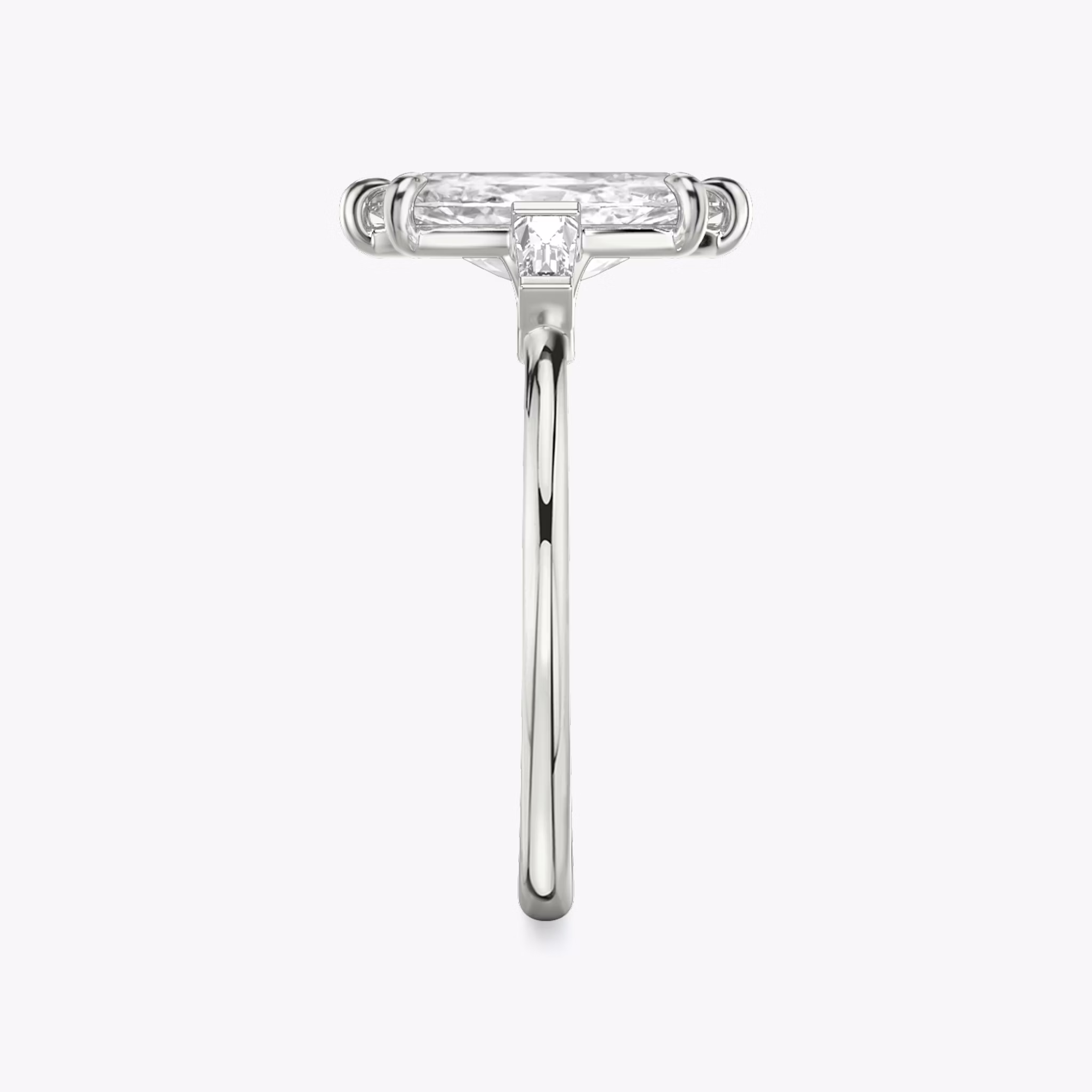 The Three Stone | Marquise | 18k | White Gold | bandAccent: Plain | sideStoneCarat: 0.10ct | sideStoneShape: Tapered Baguette | diamondOrientation: vertical | caratWeight: other