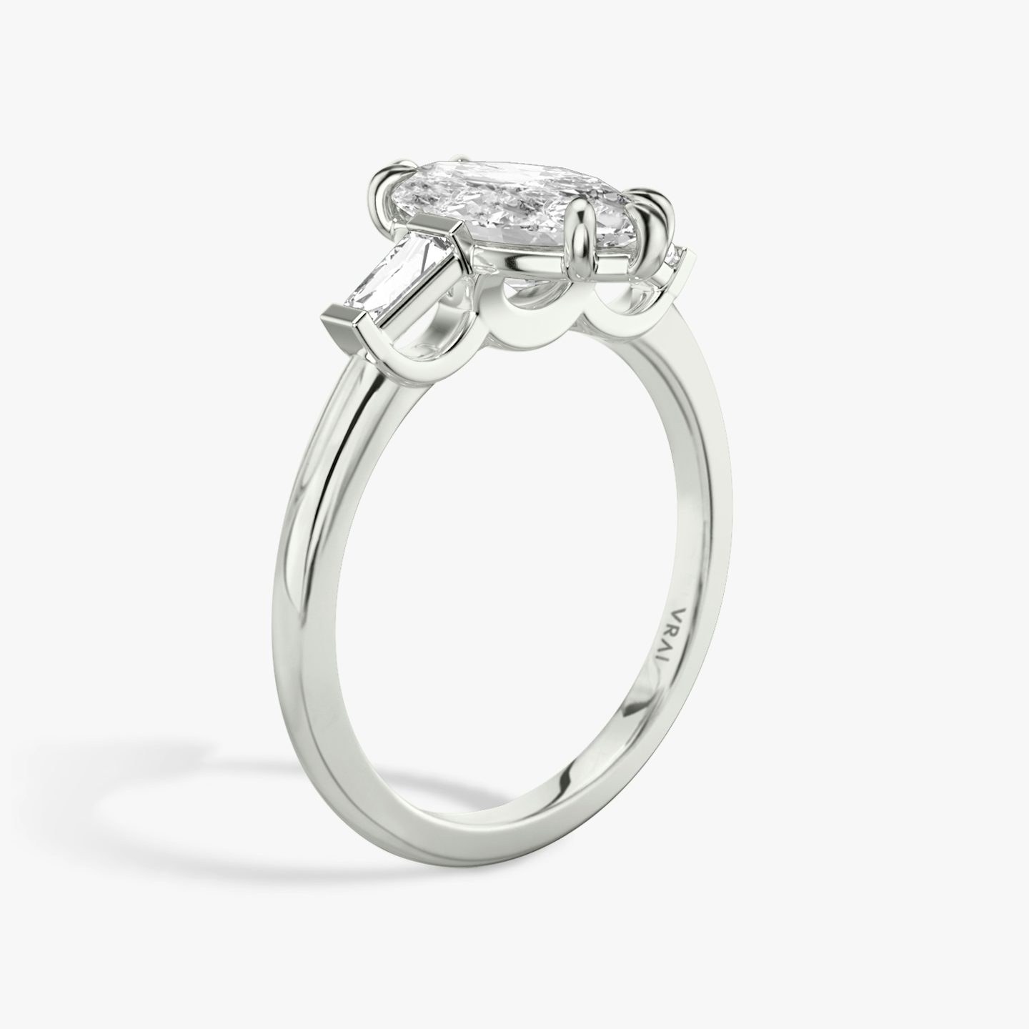 The Three Stone | Marquise | Platinum | bandAccent: Plain | sideStoneCarat: 0.10ct | sideStoneShape: Tapered Baguette | diamondOrientation: vertical | caratWeight: other