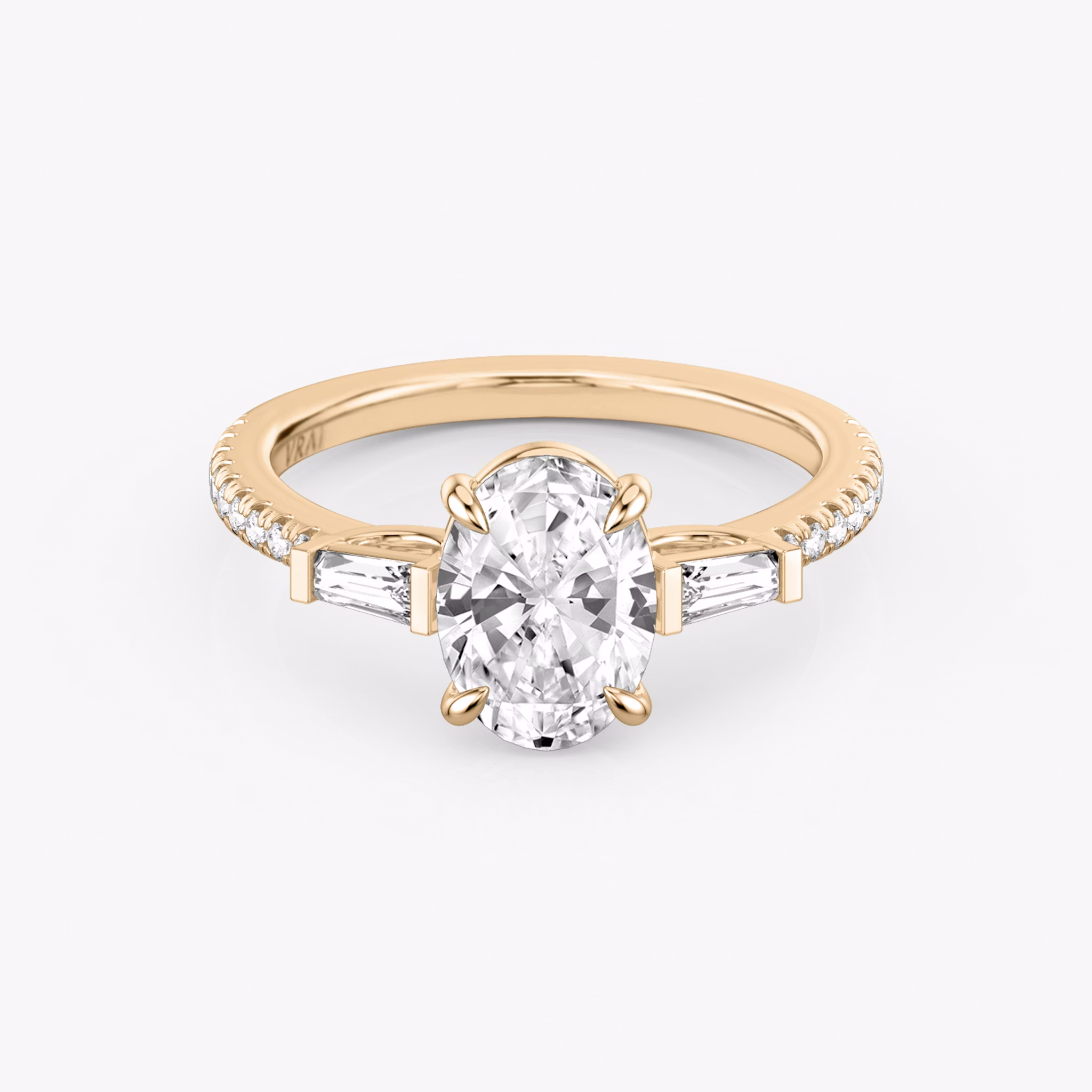 Three Stone | Oval | 14k | Roségold | bandAccent: Mit Pavé-Besatz | sideStoneCarat: 0.10ct | sideStoneShape: Konisches Baguette | diamondOrientation: vertical | caratWeight: other