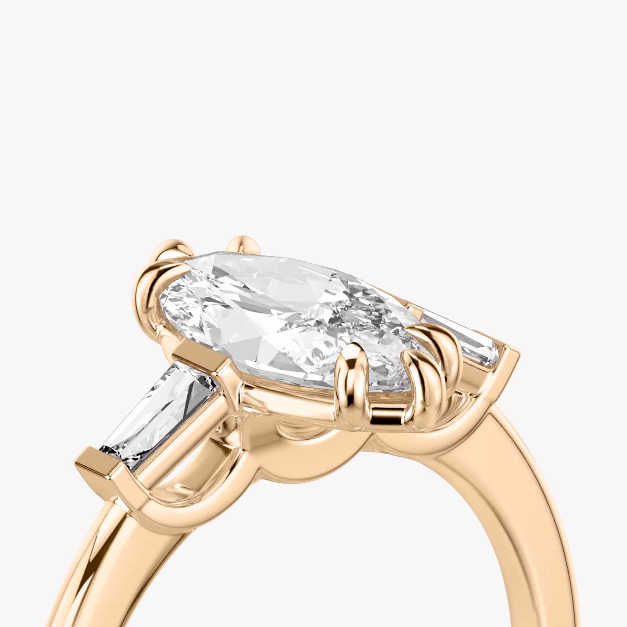 The Three Stone | Marquise | 14k | Rose Gold | bandAccent: Plain | sideStoneCarat: 0.10ct | sideStoneShape: Tapered Baguette | diamondOrientation: vertical | caratWeight: other