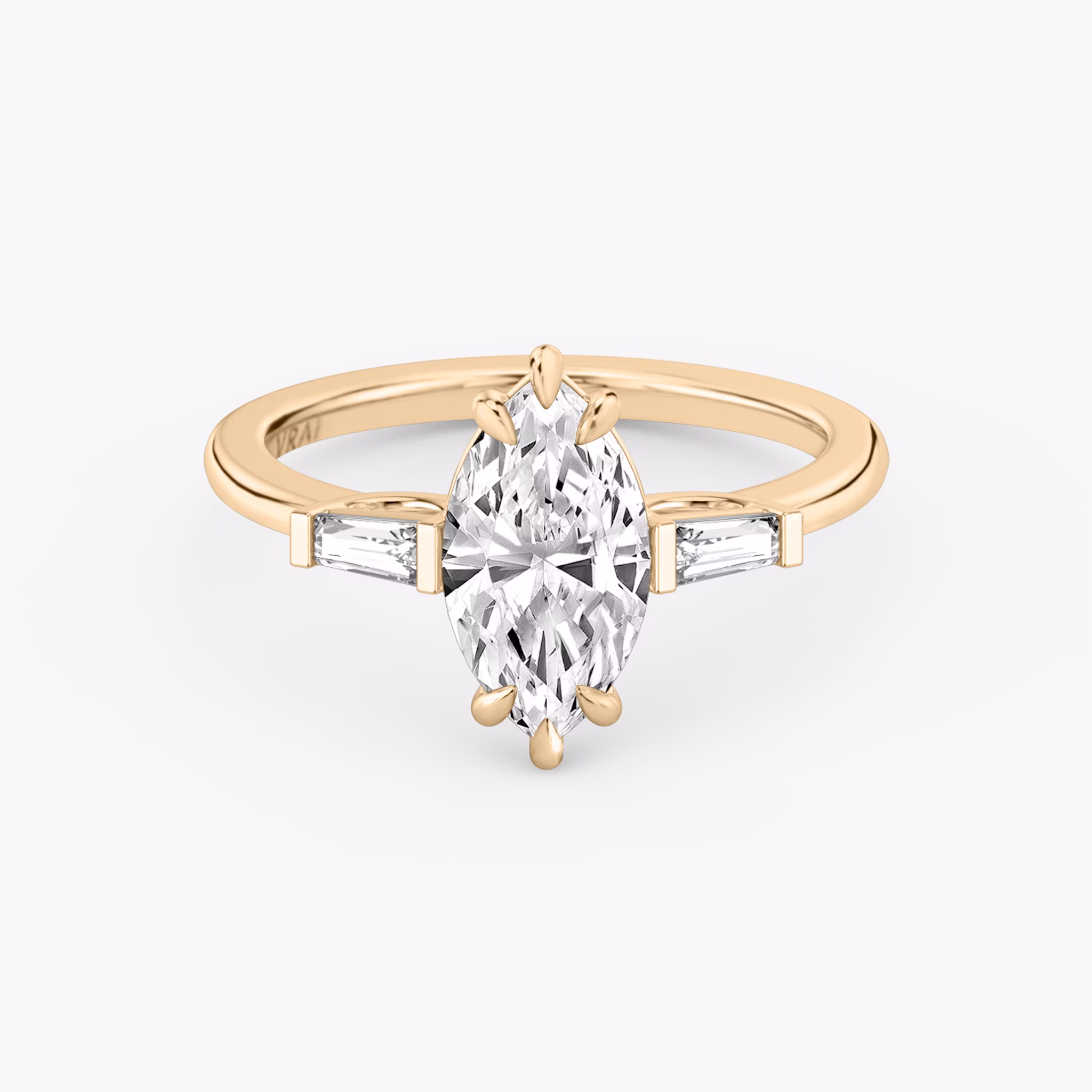 The Three Stone | Marquise | 14k | Rose Gold | bandAccent: Plain | sideStoneCarat: 0.10ct | sideStoneShape: Tapered Baguette | diamondOrientation: vertical | caratWeight: other