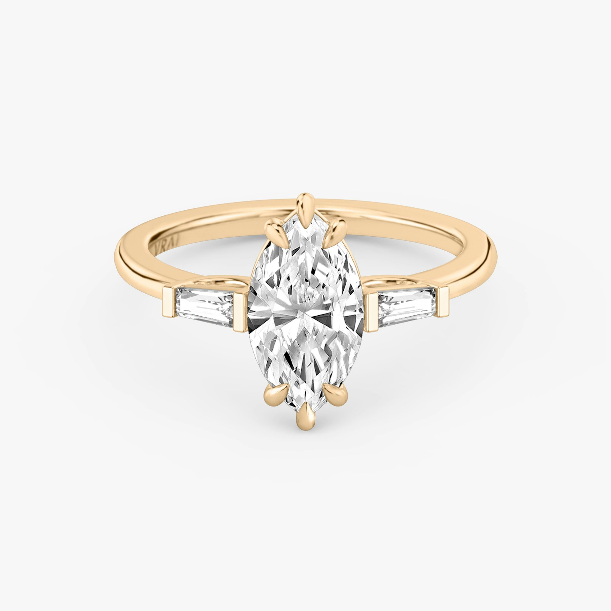The Three Stone | Marquise | 14k | Rose Gold | bandAccent: Plain | sideStoneCarat: 0.10ct | sideStoneShape: Tapered Baguette | diamondOrientation: vertical | caratWeight: other