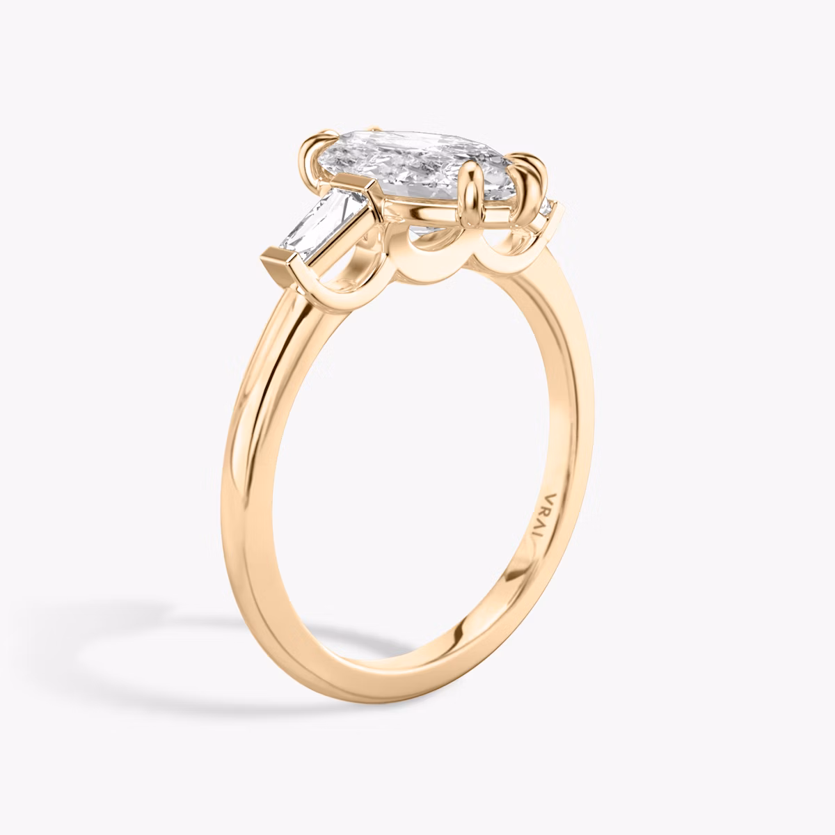 The Three Stone | Marquise | 14k | Rose Gold | bandAccent: Plain | sideStoneCarat: 0.10ct | sideStoneShape: Tapered Baguette | diamondOrientation: vertical | caratWeight: other