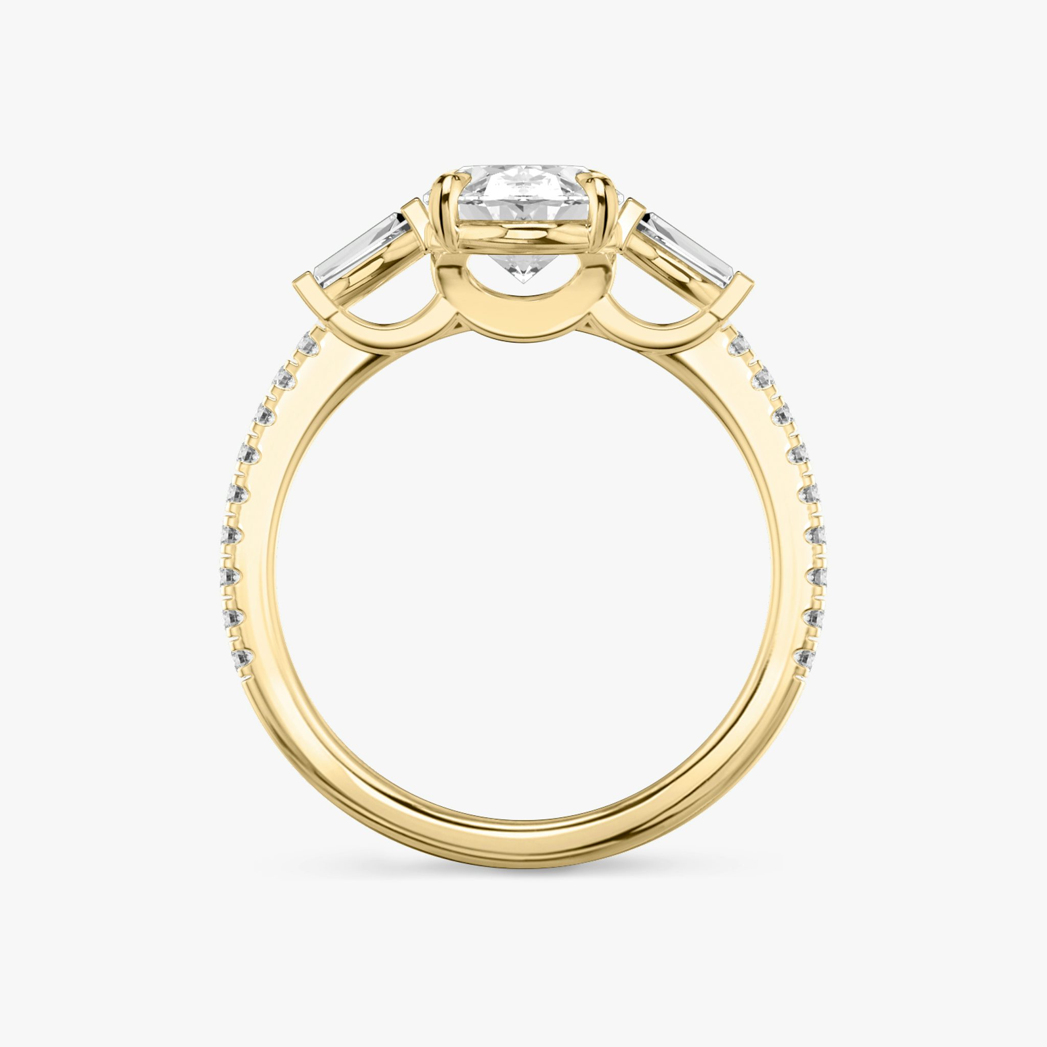 The Three Stone | Oval | 18k | Yellow Gold | bandAccent: Pavé | sideStoneCarat: 0.10ct | sideStoneShape: Tapered Baguette | diamondOrientation: vertical | caratWeight: other