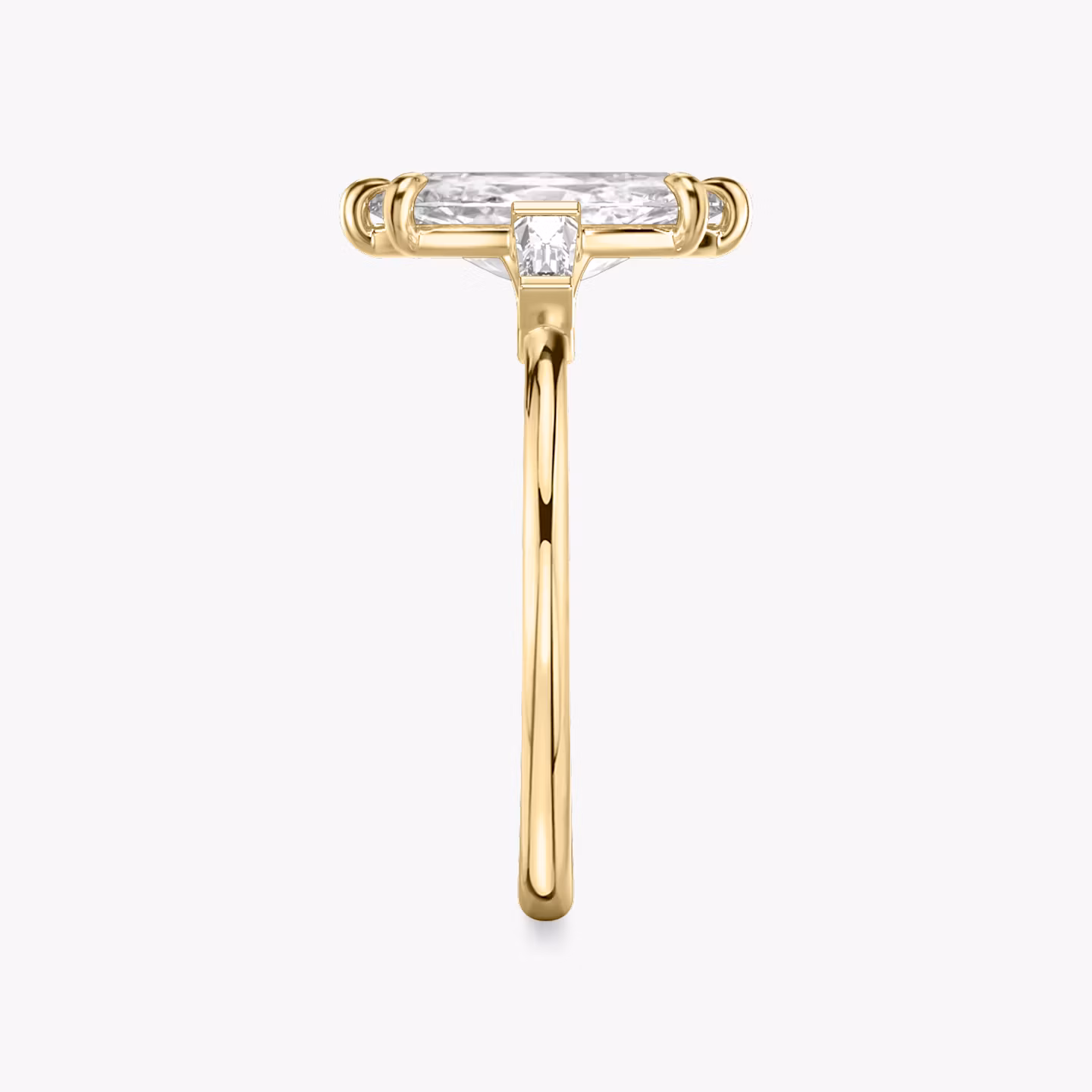 The Three Stone | Marquise | 18k | Yellow Gold | bandAccent: Plain | sideStoneCarat: 0.10ct | sideStoneShape: Tapered Baguette | diamondOrientation: vertical | caratWeight: other