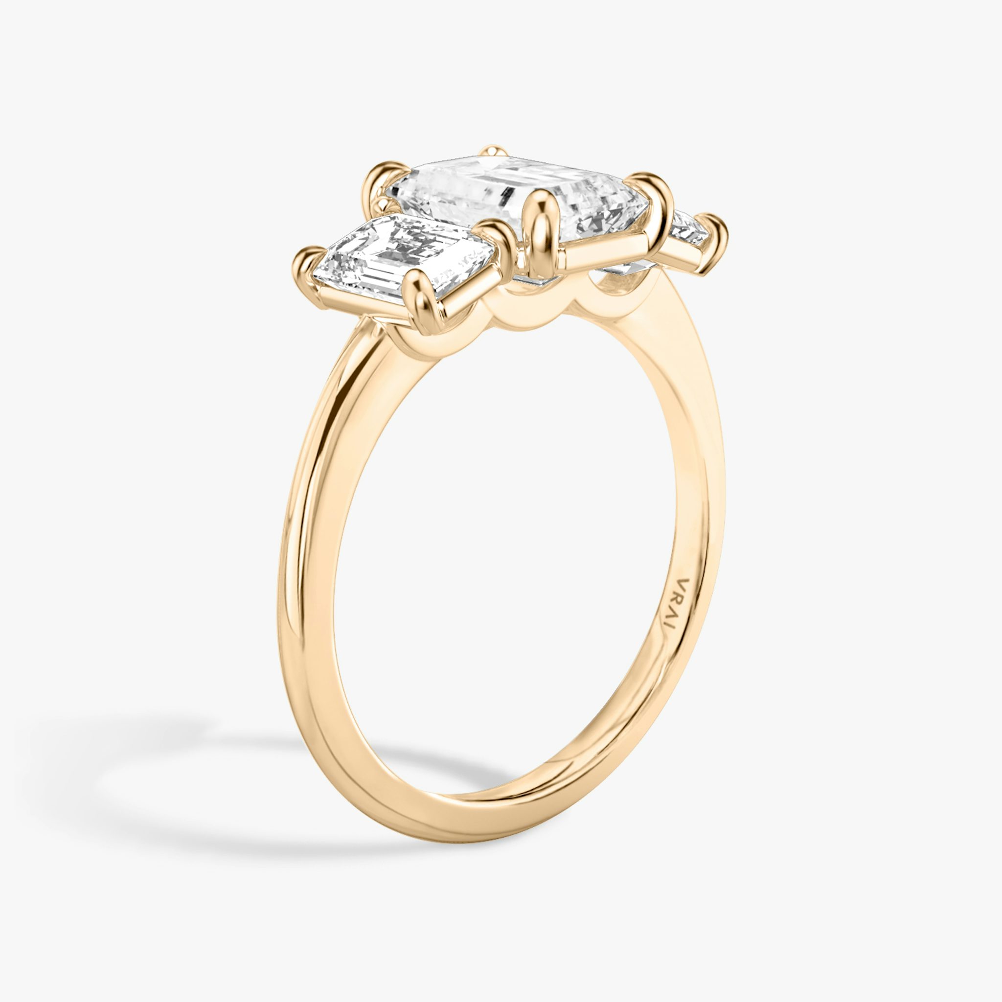 The Three Stone | Emerald | 14k | Rose Gold | bandAccent: Plain | sideStoneCarat: 0.50ct | sideStoneShape: Emerald | diamondOrientation: vertical | caratWeight: other