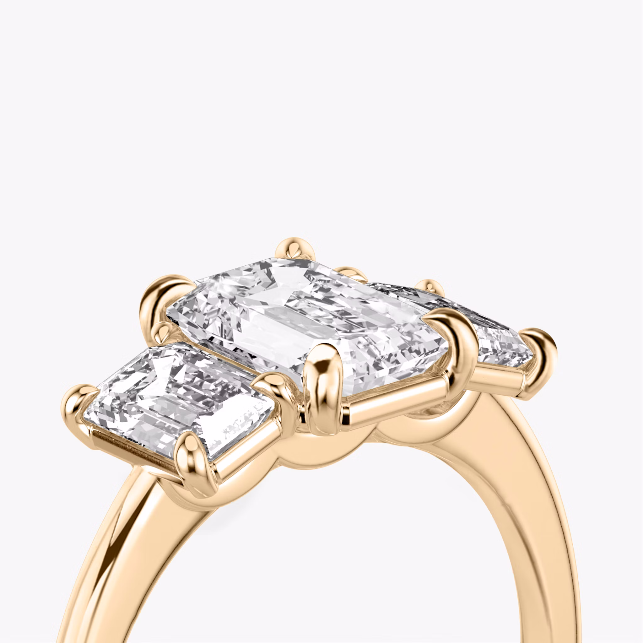 The Three Stone | Emerald | 14k | Rose Gold | bandAccent: Plain | sideStoneCarat: 0.50ct | sideStoneShape: Emerald | diamondOrientation: vertical | caratWeight: other