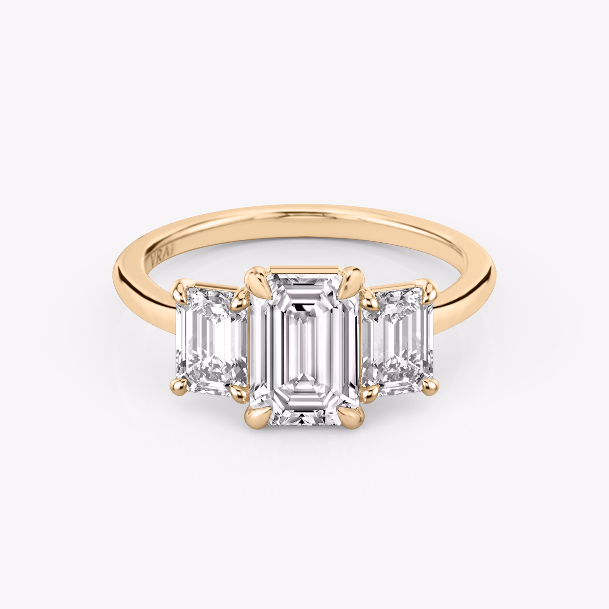 The Three Stone | Emerald | 14k | Rose Gold | bandAccent: Plain | sideStoneCarat: 0.50ct | sideStoneShape: Emerald | diamondOrientation: vertical | caratWeight: other