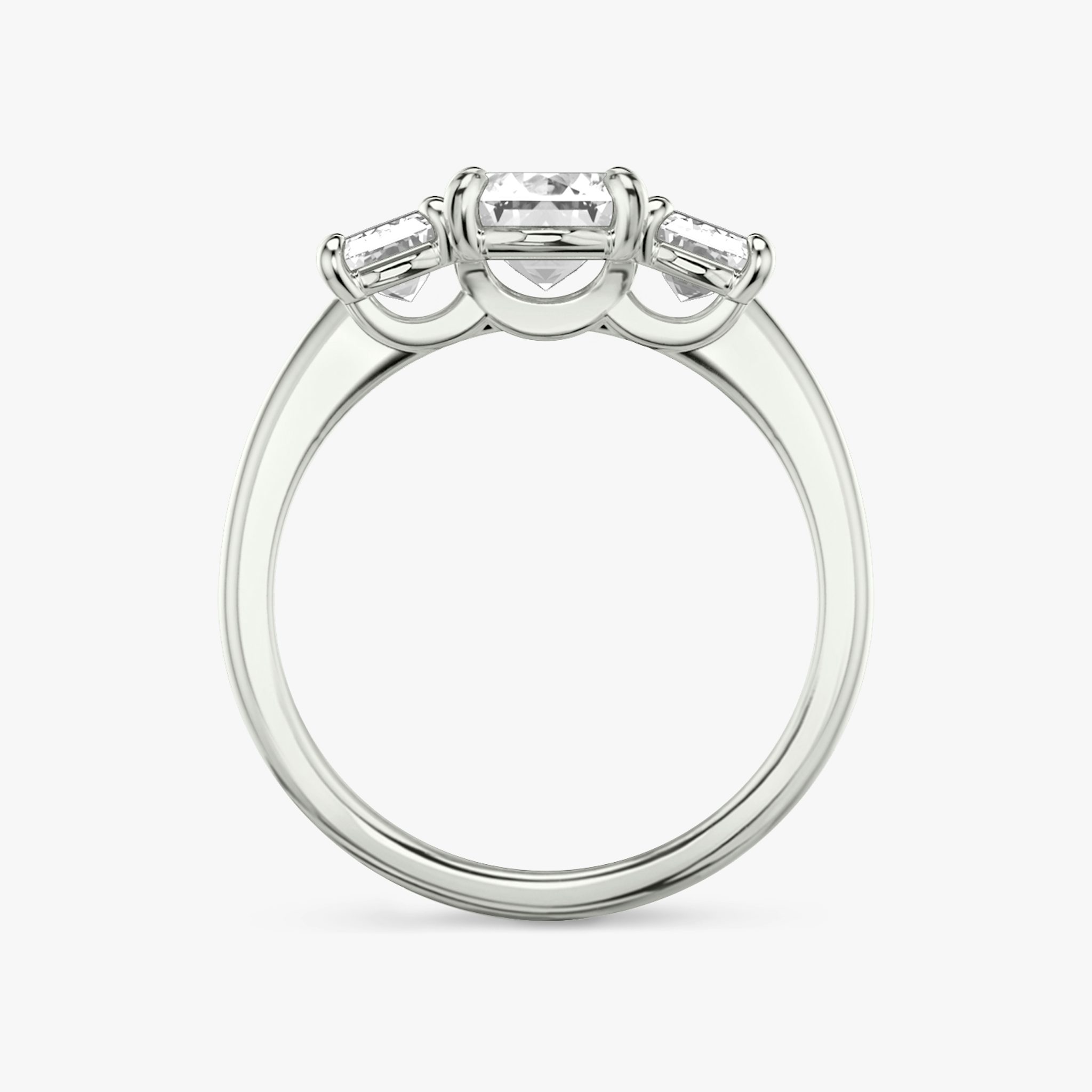 The Three Stone | Emerald | 18k | White Gold | bandAccent: Plain | sideStoneCarat: 0.50ct | sideStoneShape: Emerald | diamondOrientation: vertical | caratWeight: other