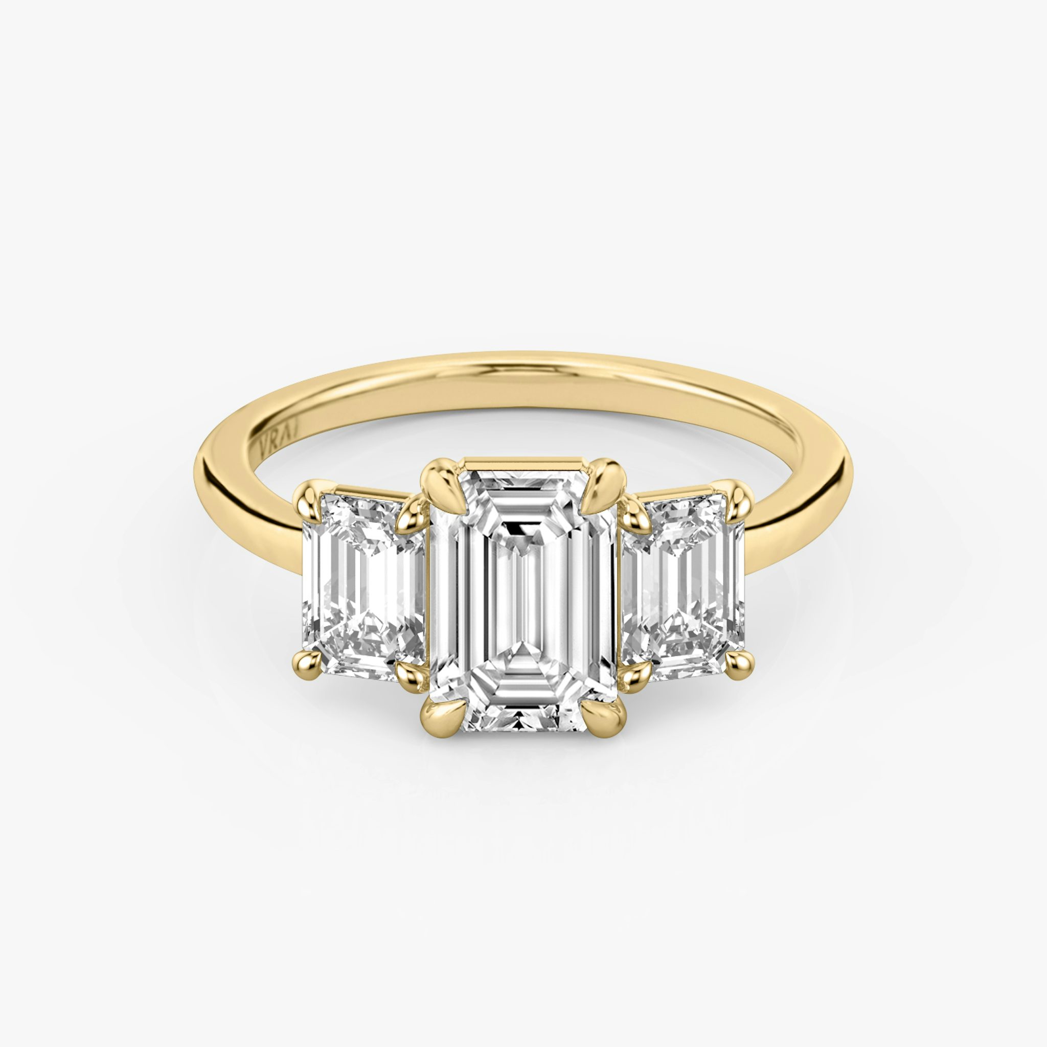 The Three Stone | Emerald | 18k | Yellow Gold | bandAccent: Plain | sideStoneCarat: 0.50ct | sideStoneShape: Emerald | diamondOrientation: vertical | caratWeight: other