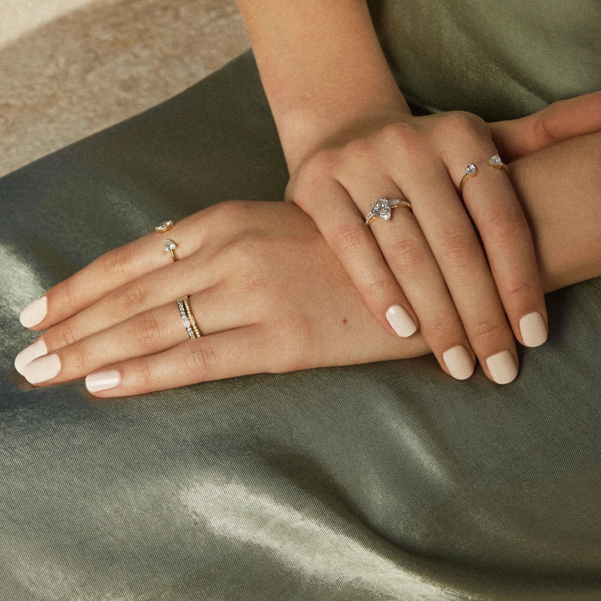 The Three Stone | Pear | 18k | Yellow Gold | bandAccent: Pavé | sideStoneCarat: 0.10ct | sideStoneShape: Tapered Baguette | diamondOrientation: vertical | caratWeight: other