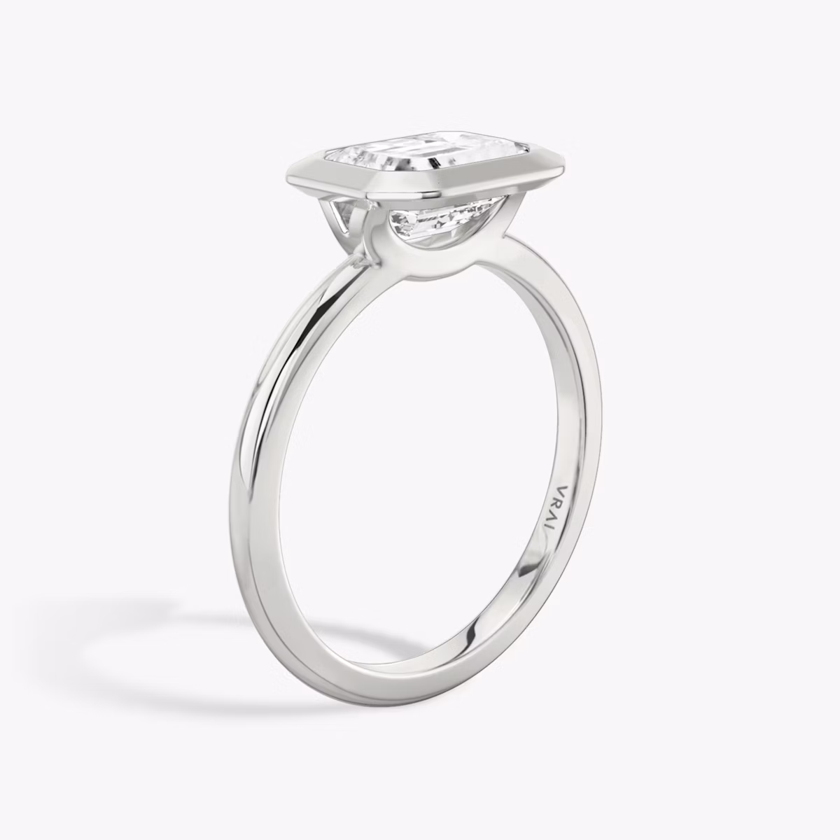 The Signature Bezel | Emerald | Platinum | bandAccent: Plain | diamondOrientation: horizontal | caratWeight: other