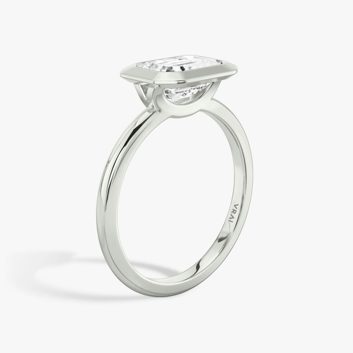 The Signature Bezel | Emerald | Platinum | bandAccent: Plain | diamondOrientation: horizontal | caratWeight: other