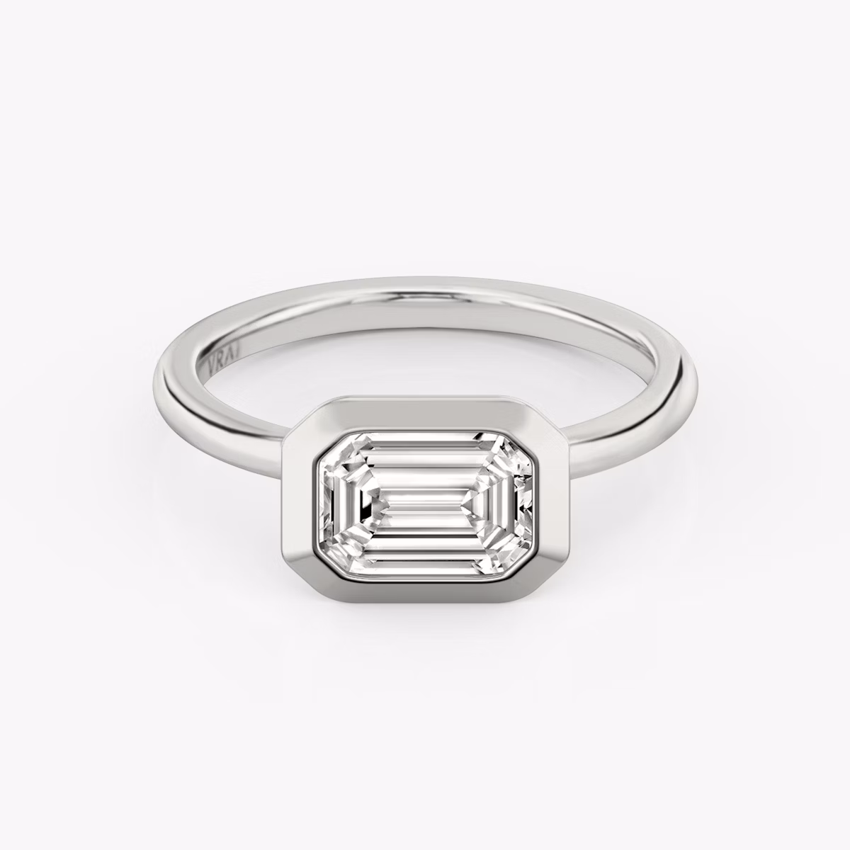 The Signature Bezel | Emerald | Platinum | bandAccent: Plain | diamondOrientation: horizontal | caratWeight: other