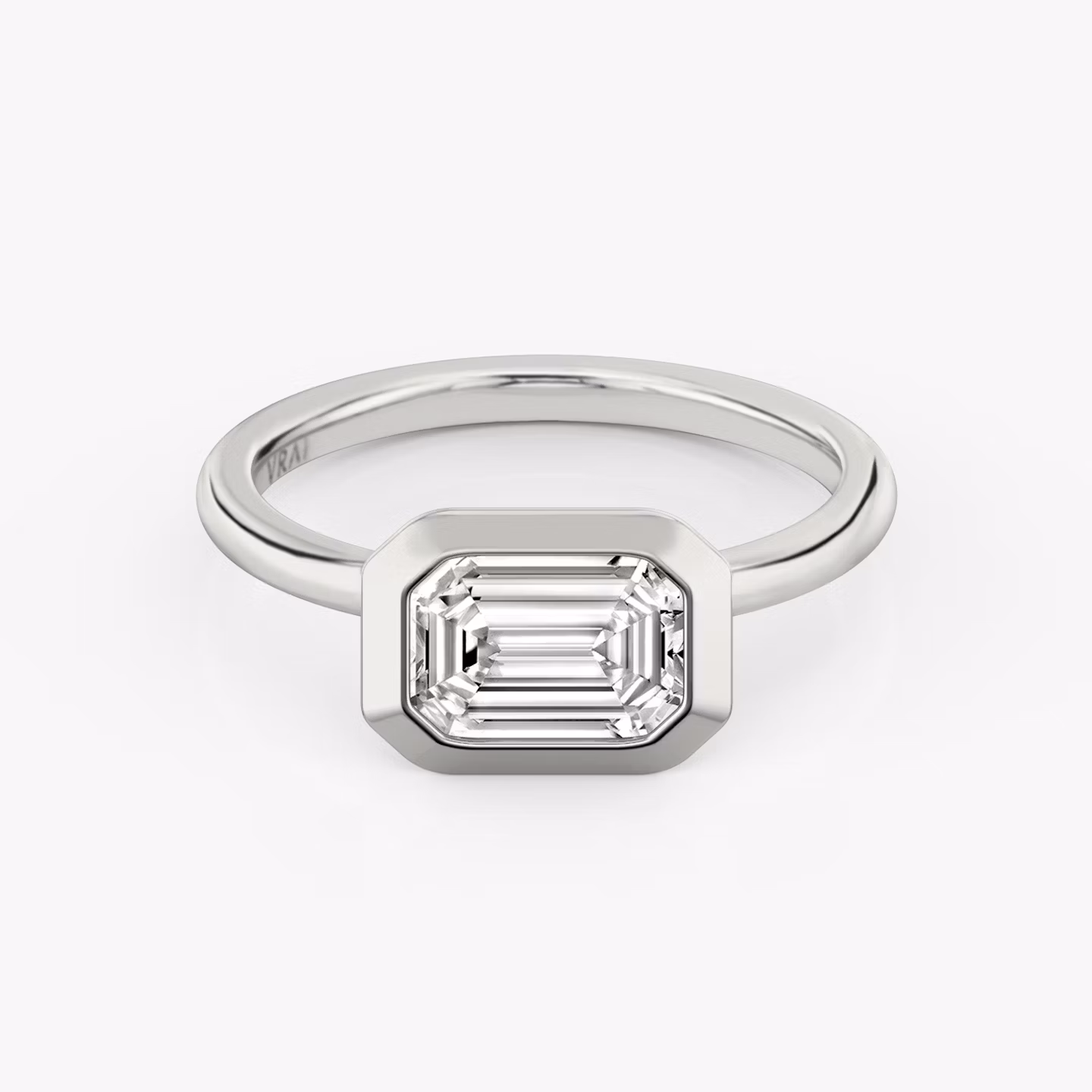 The Signature Bezel | Emerald | Platinum | bandAccent: Plain | diamondOrientation: horizontal | caratWeight: other