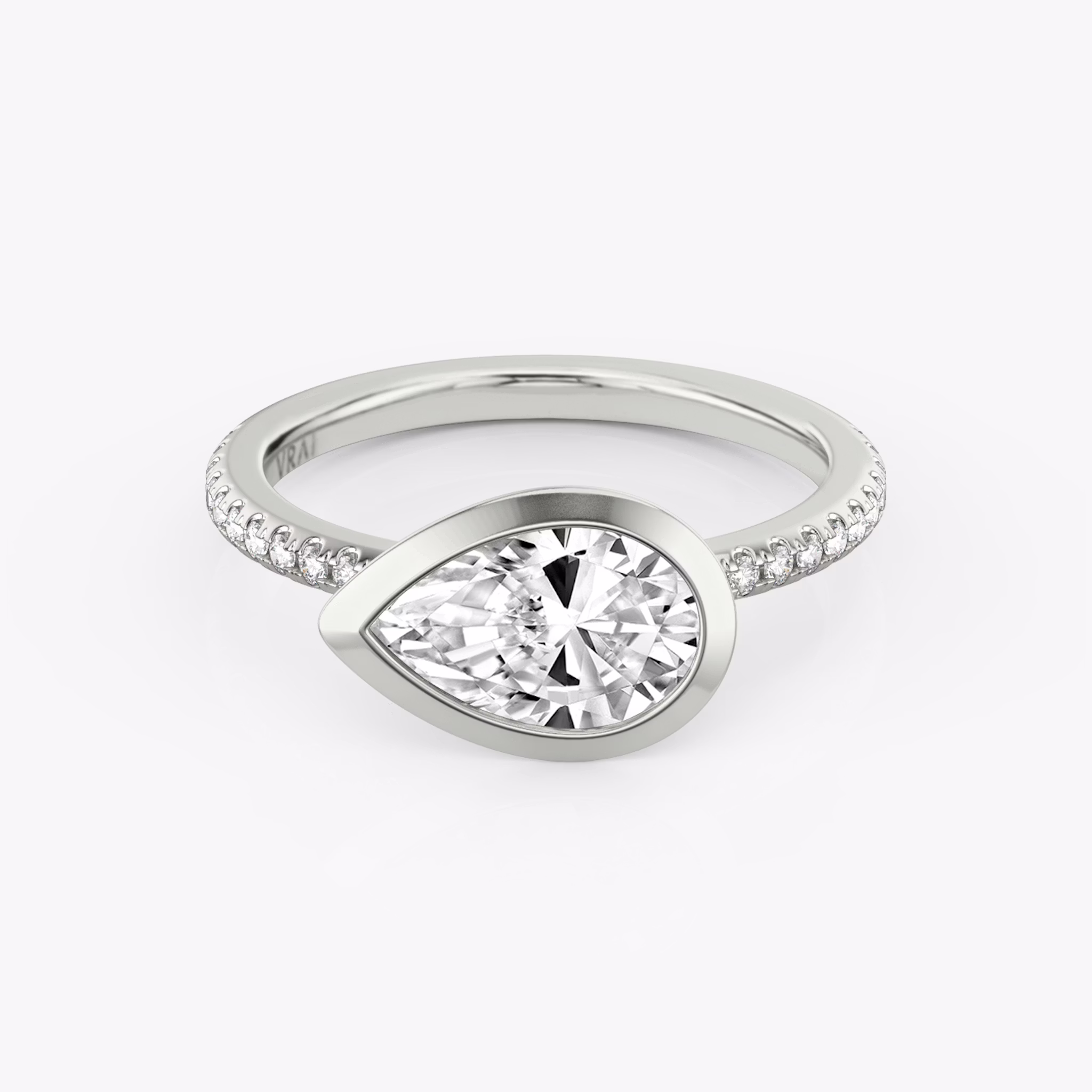 The Signature Bezel | Pear | 18k | White Gold | bandAccent: Pavé | diamondOrientation: horizontal | caratWeight: other