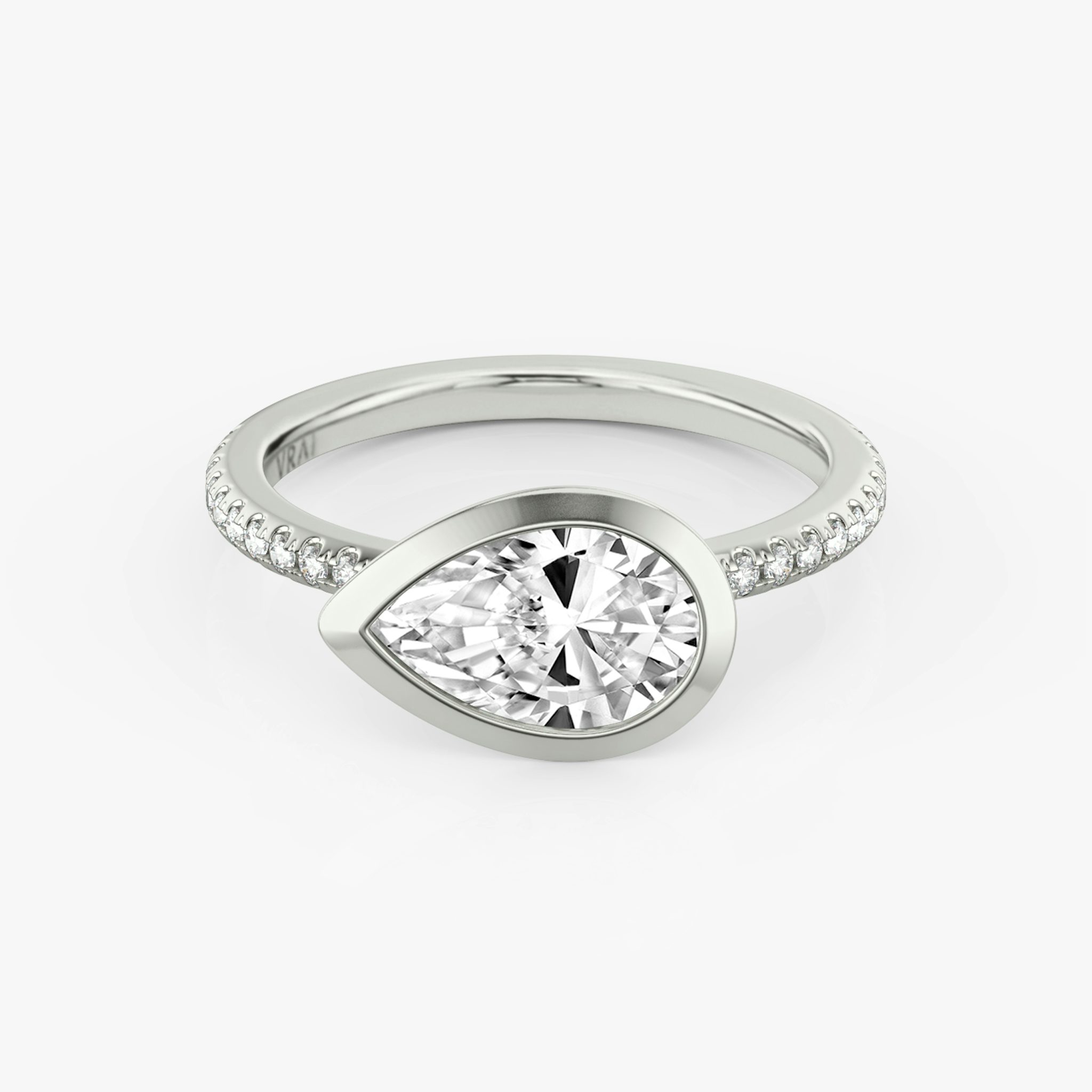 The Signature Bezel | Pear | 18k | White Gold | bandAccent: Pavé | diamondOrientation: horizontal | caratWeight: other