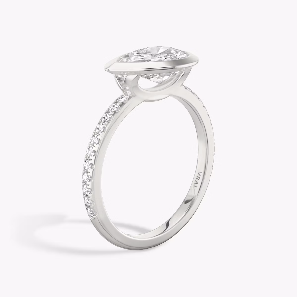The Signature Bezel | Pear | Platinum | bandAccent: Pavé | diamondOrientation: horizontal | caratWeight: other