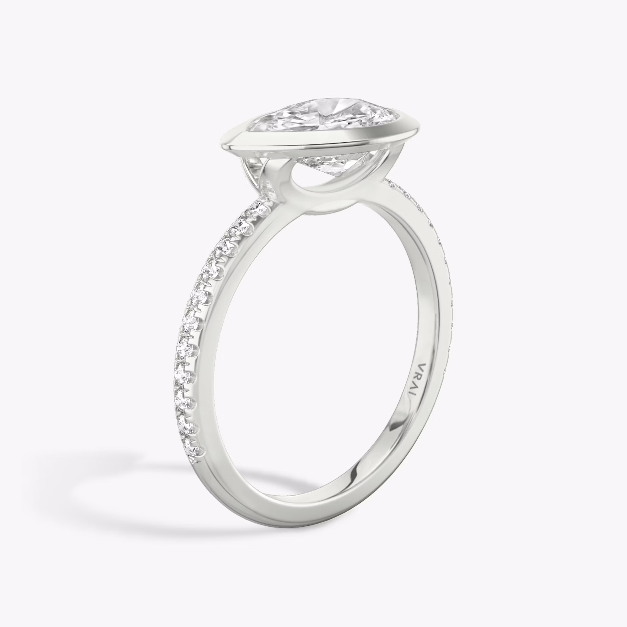 The Signature Bezel | Pear | 18k | White Gold | bandAccent: Pavé | diamondOrientation: horizontal | caratWeight: other