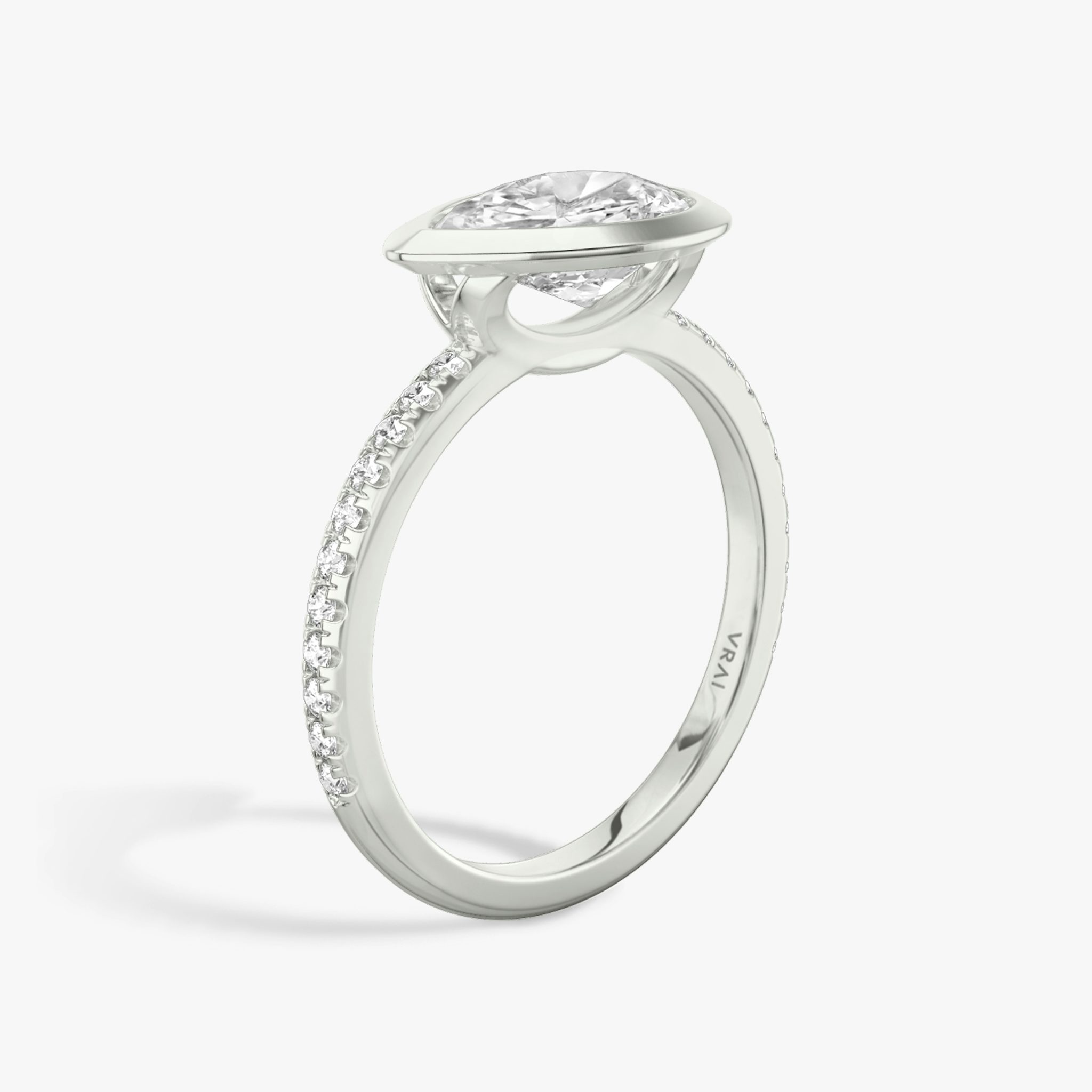 The Signature Bezel | Pear | 18k | White Gold | bandAccent: Pavé | diamondOrientation: horizontal | caratWeight: other