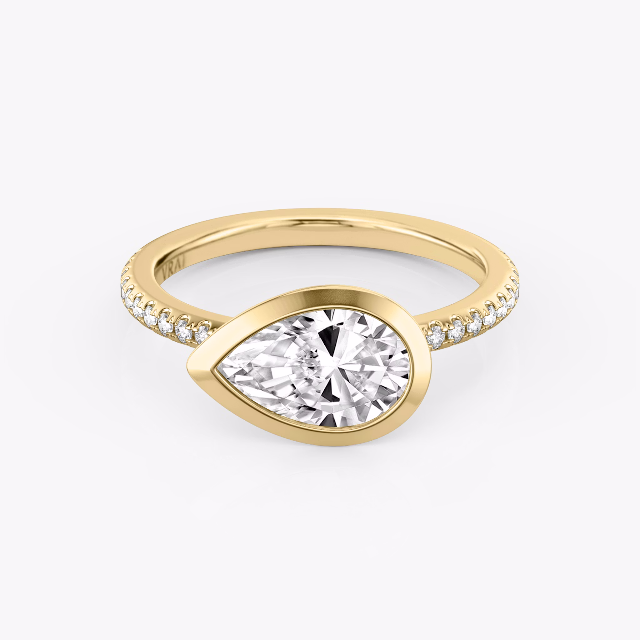 The Signature Bezel | Pear | 18k | Yellow Gold | bandAccent: Pavé | diamondOrientation: horizontal | caratWeight: other